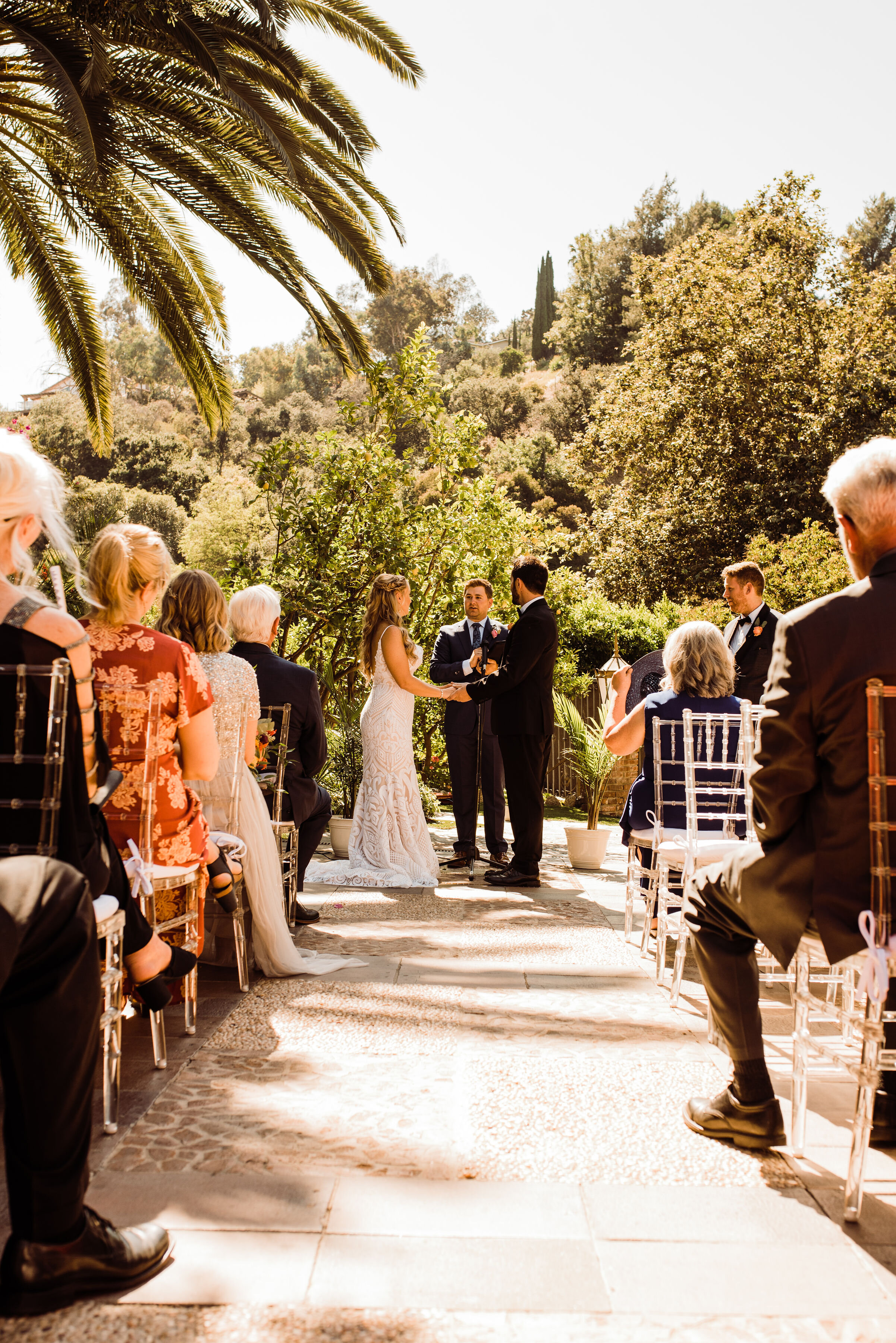 Houdini Estate Wedding Ceremony on Mosaic Drive - Bride in Hayley Paige Blush Dress and Groom in Black Tux - Historic LA Wedding Venue | Kept Record | www.keptrecord.com