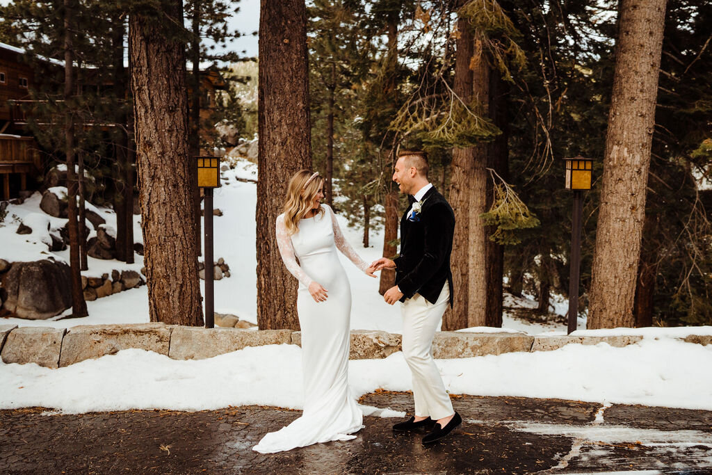 Snowy-Lake-Tahoe-Cabin-Elopement-Groom-Reacts-to-seeing-bride.jpg