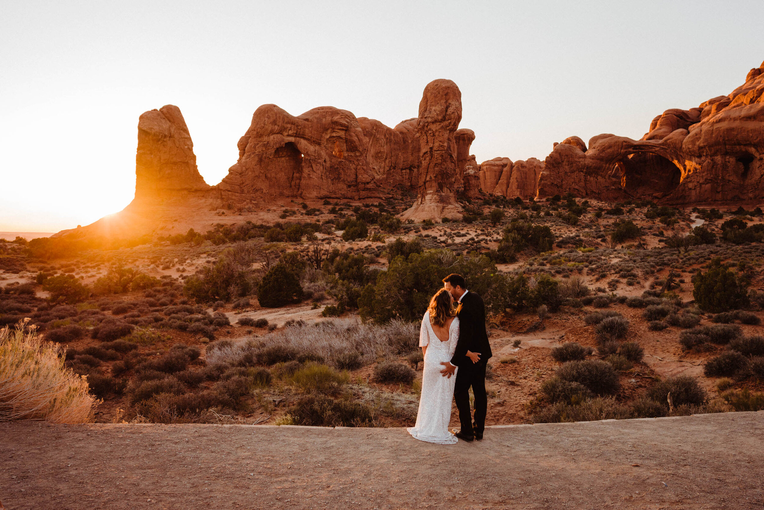 moab-elopement-wedding-bride-and-groom-sunset-arches-national-park.jpg