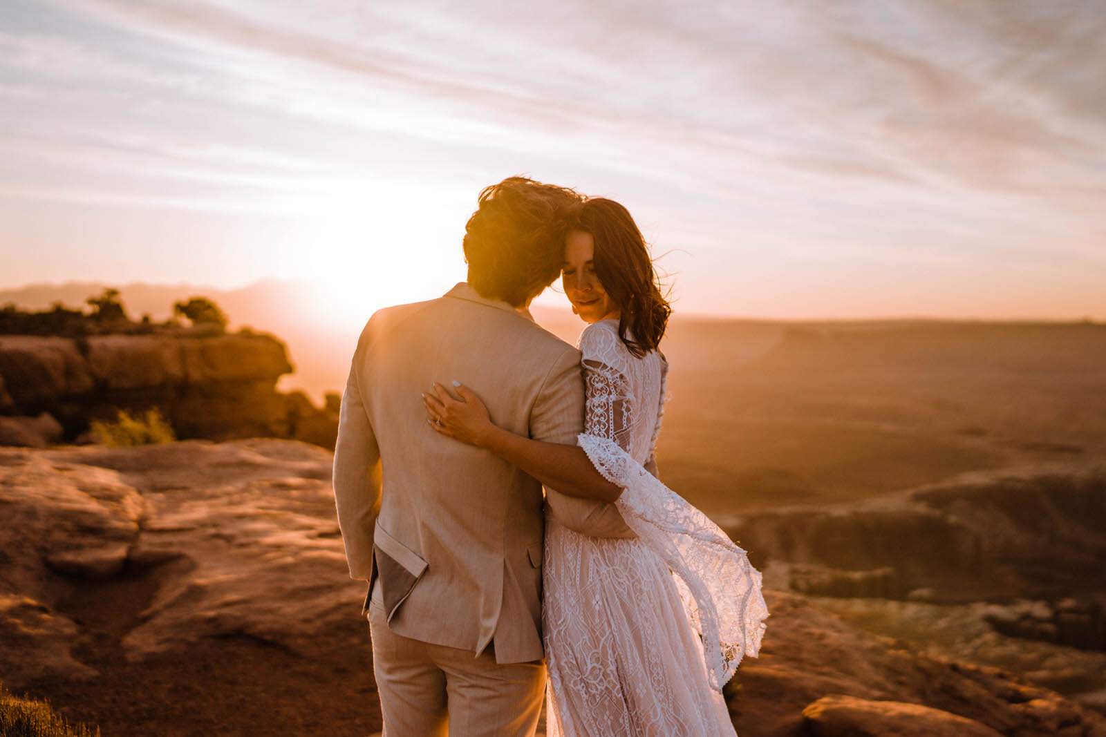 Bride-and-groom-hiking-elopement-in-Moab-Utah.jpg