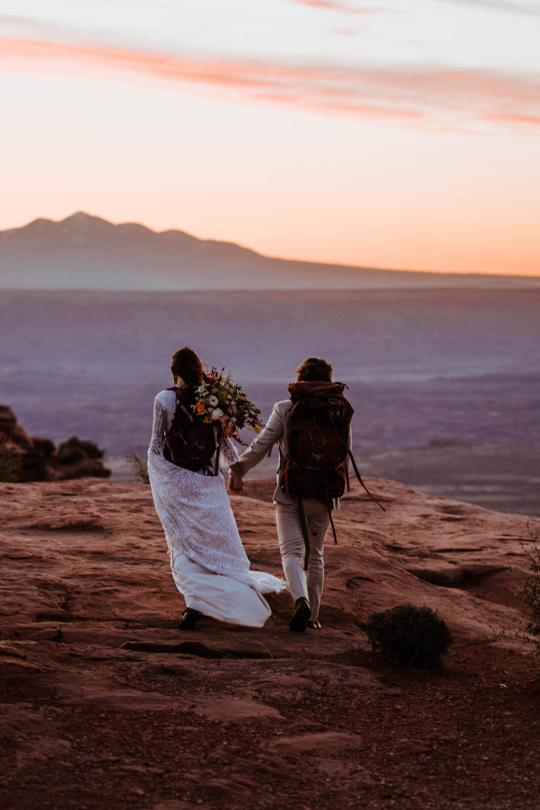 Moab-Hiking-at-Canyonlands-National-Park-with-Bride-and-Groom.jpg