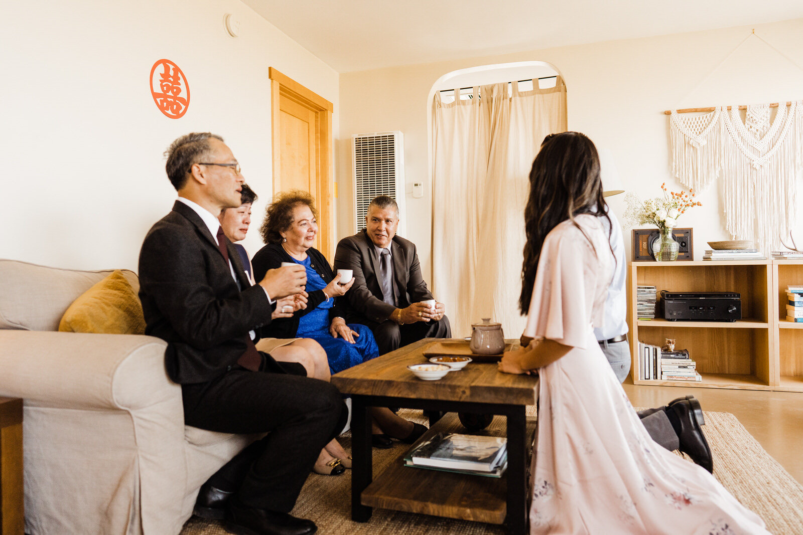 Bride and Groom Serve Parents Tea at Chinese Tea Ceremony at Joshua Tree Wedding