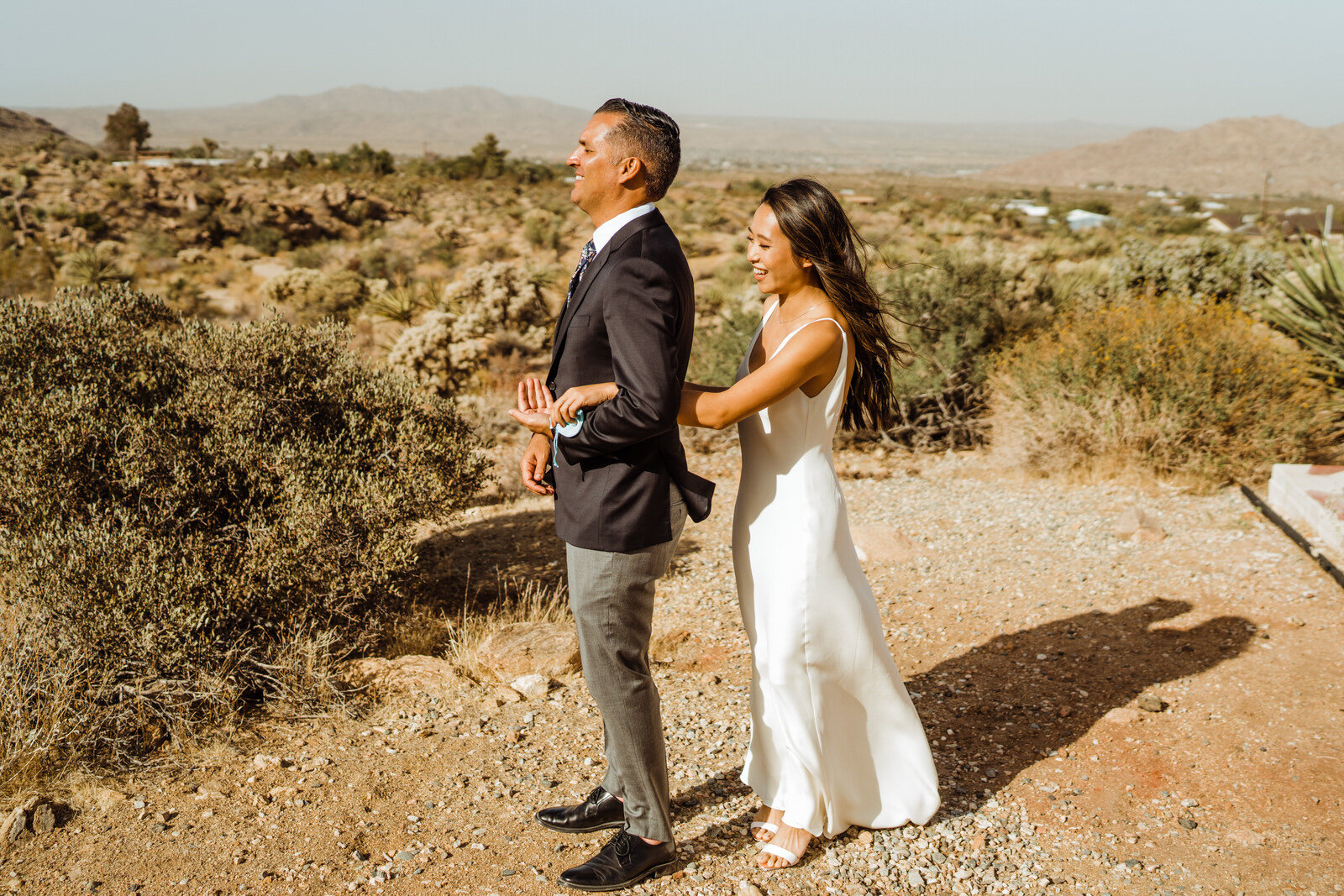 Bride walks up to Groom for First Look at Joshua Tree Wedding