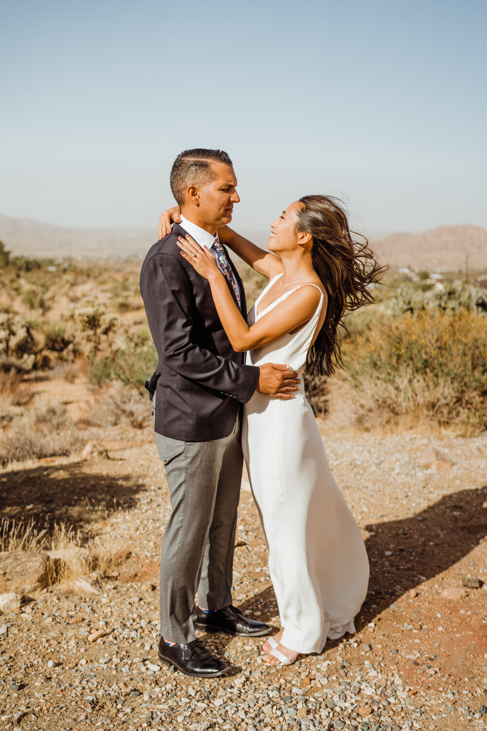 Bride and Groom Embrace in Joshua Tree