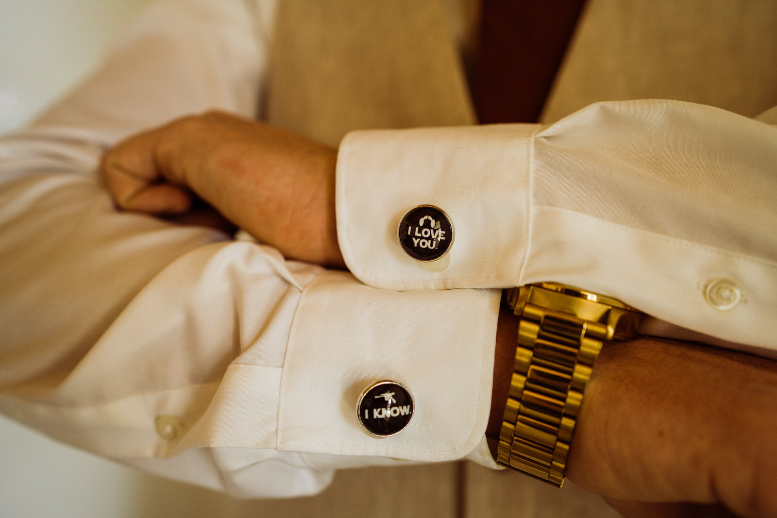 Fall-Wedding-in-Joshua-Tree-Groom-in-Tan-Suit-Getting-Ready-with-Star-Wars-Cufflinks (1).jpg