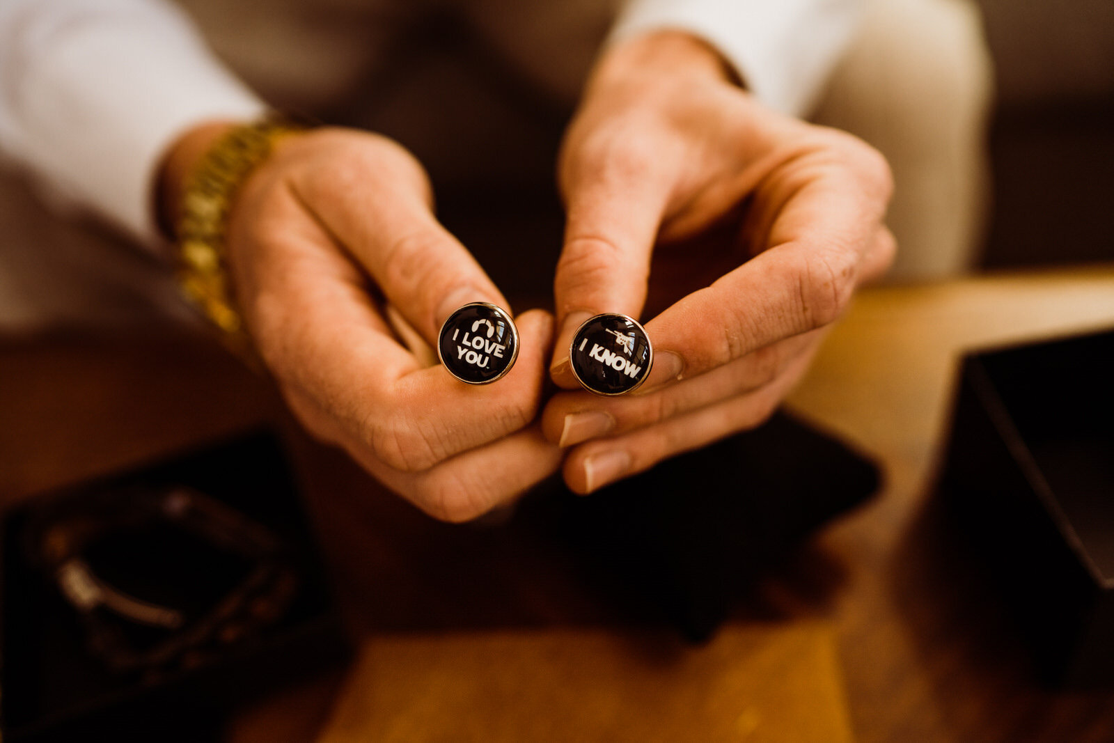 Fall-Wedding-in-Joshua-Tree-Groom-in-Tan-Suit-Getting-Ready-with-Star-Wars-Cufflinks (6).jpg