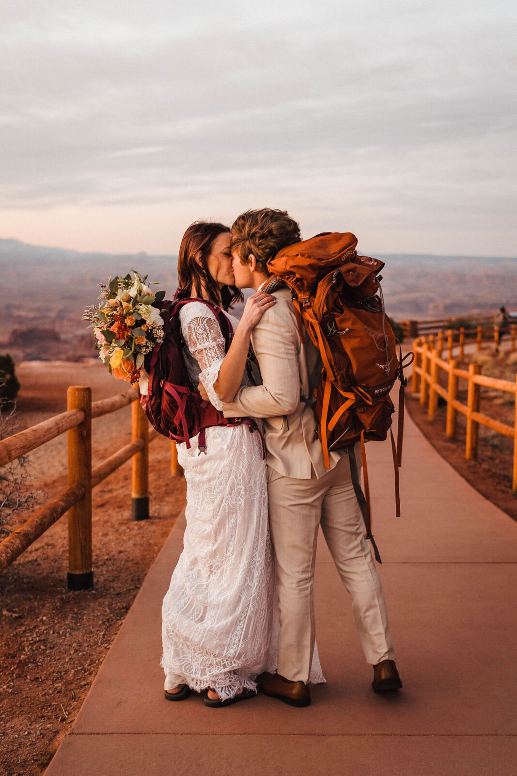 Bride and Groom Hiking Sunrise Elopement in Canyonlands National Park | Moab Wedding Photographer Kept Record | www.keptrecord.com
