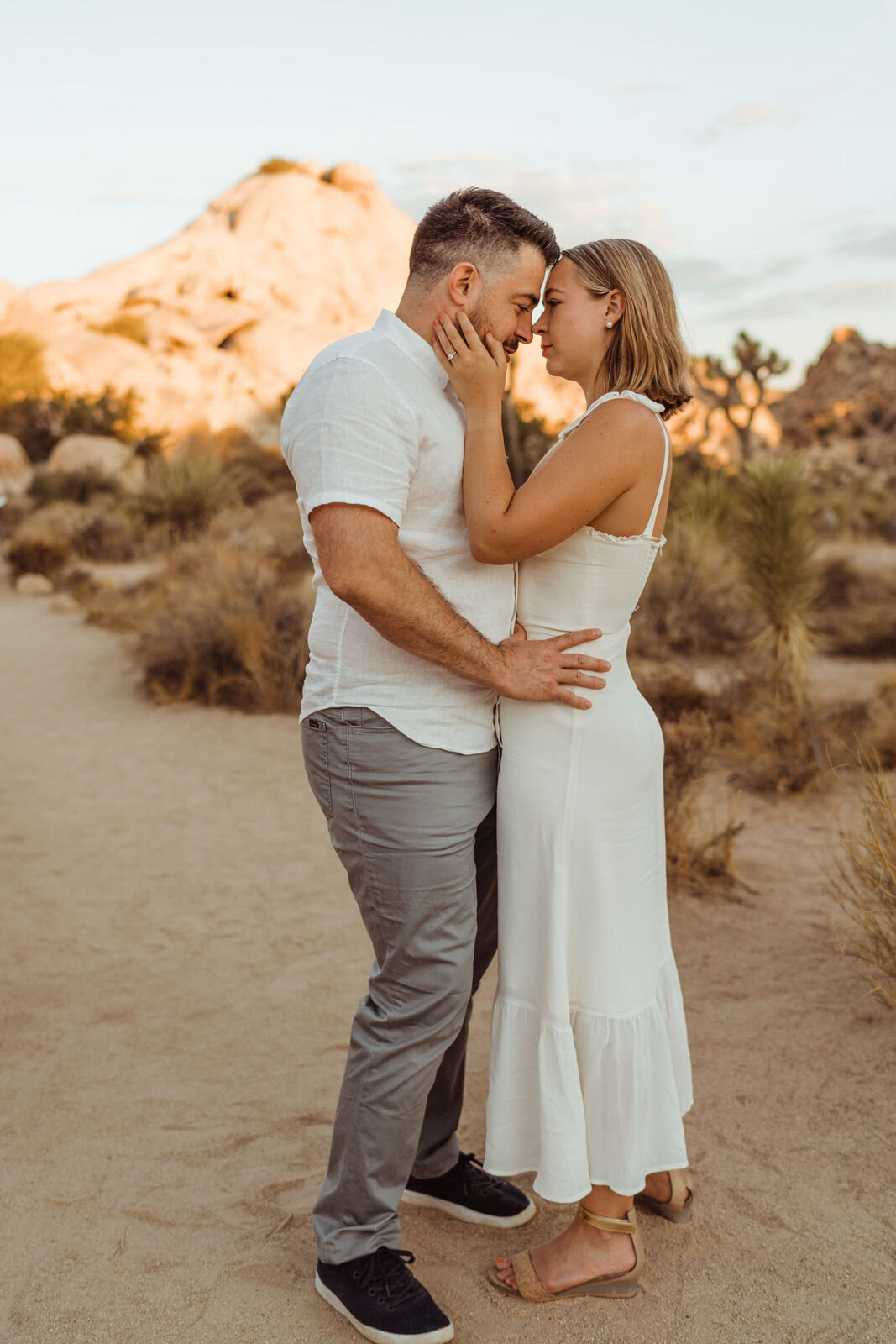 Sunrise Summer Engagement Session - Neutral Photoshoot Outfits - Dark and Moody Engagement Photos by adventurous Joshua Tree Wedding and Elopement Photographer Kept Record | www.keptrecord.com