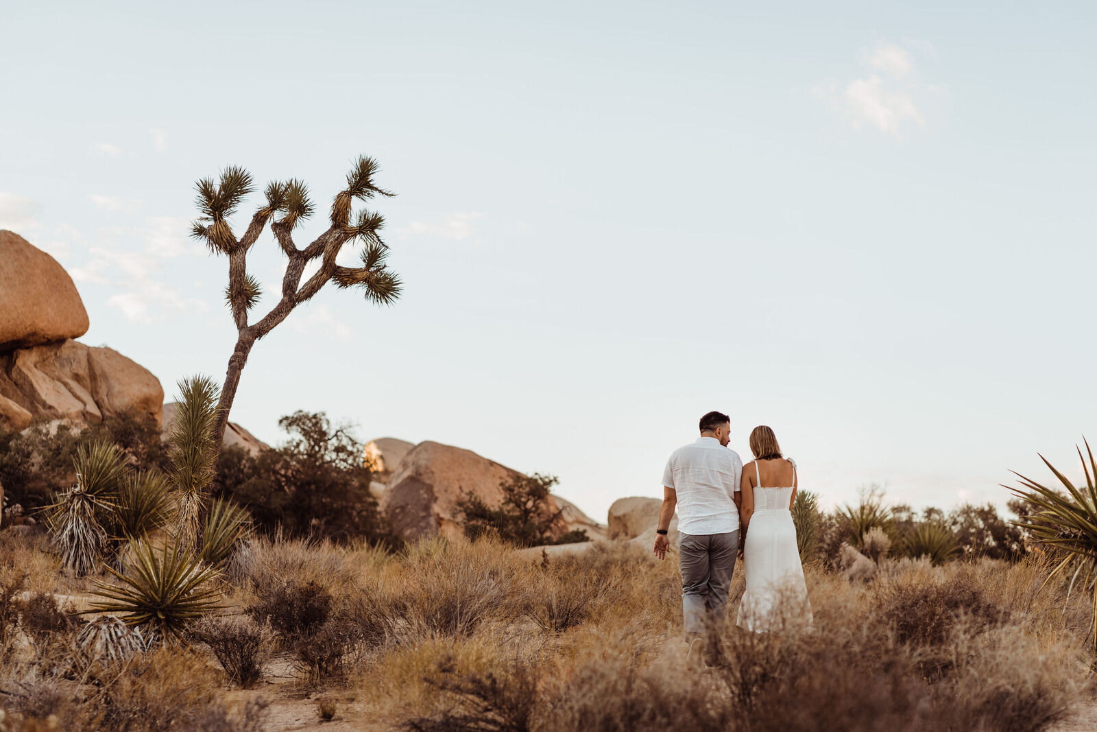 Sunrise Engagement Session in Joshua Tree - Neutral Photoshoot Outfits - Dark and Moody Engagement Photos by adventurous Joshua Tree Wedding and Elopement Photographer Kept Record | www.keptrecord.com