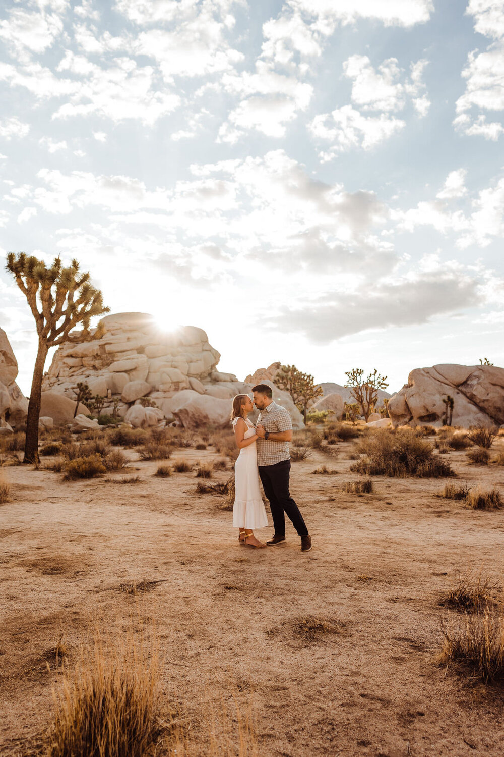 Sunrise Engagement Session in Joshua Tree - Neutral Photoshoot Outfits - Dark and Moody Engagement Photos by adventurous Joshua Tree Wedding and Elopement Photographer Kept Record | www.keptrecord.com