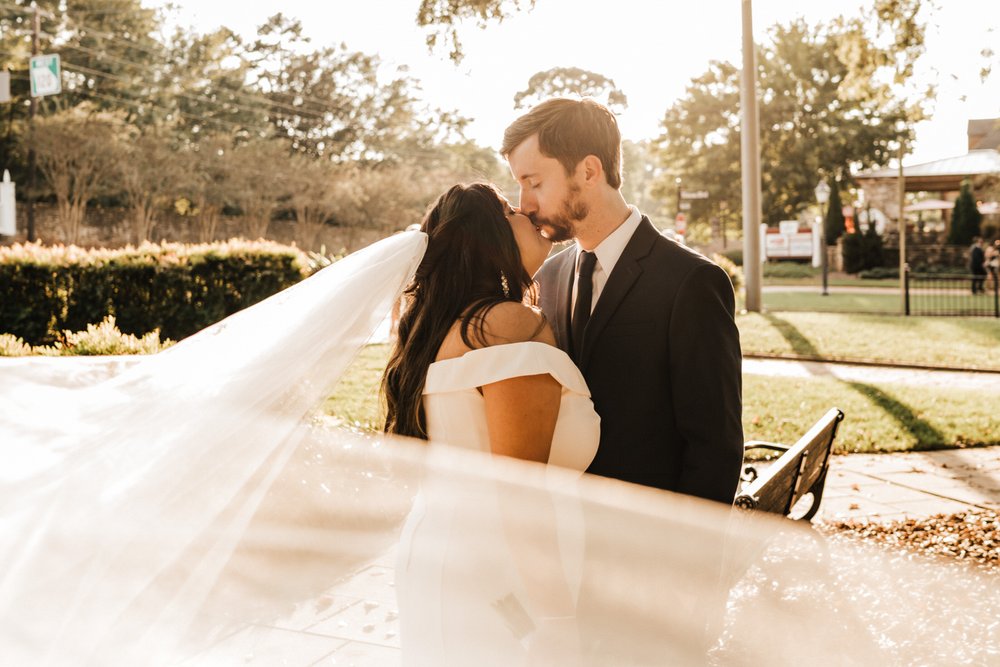 Georgia-Wedding-Bride-and-Groom-with-veil-at-Roswell-Town-Square (6).jpg