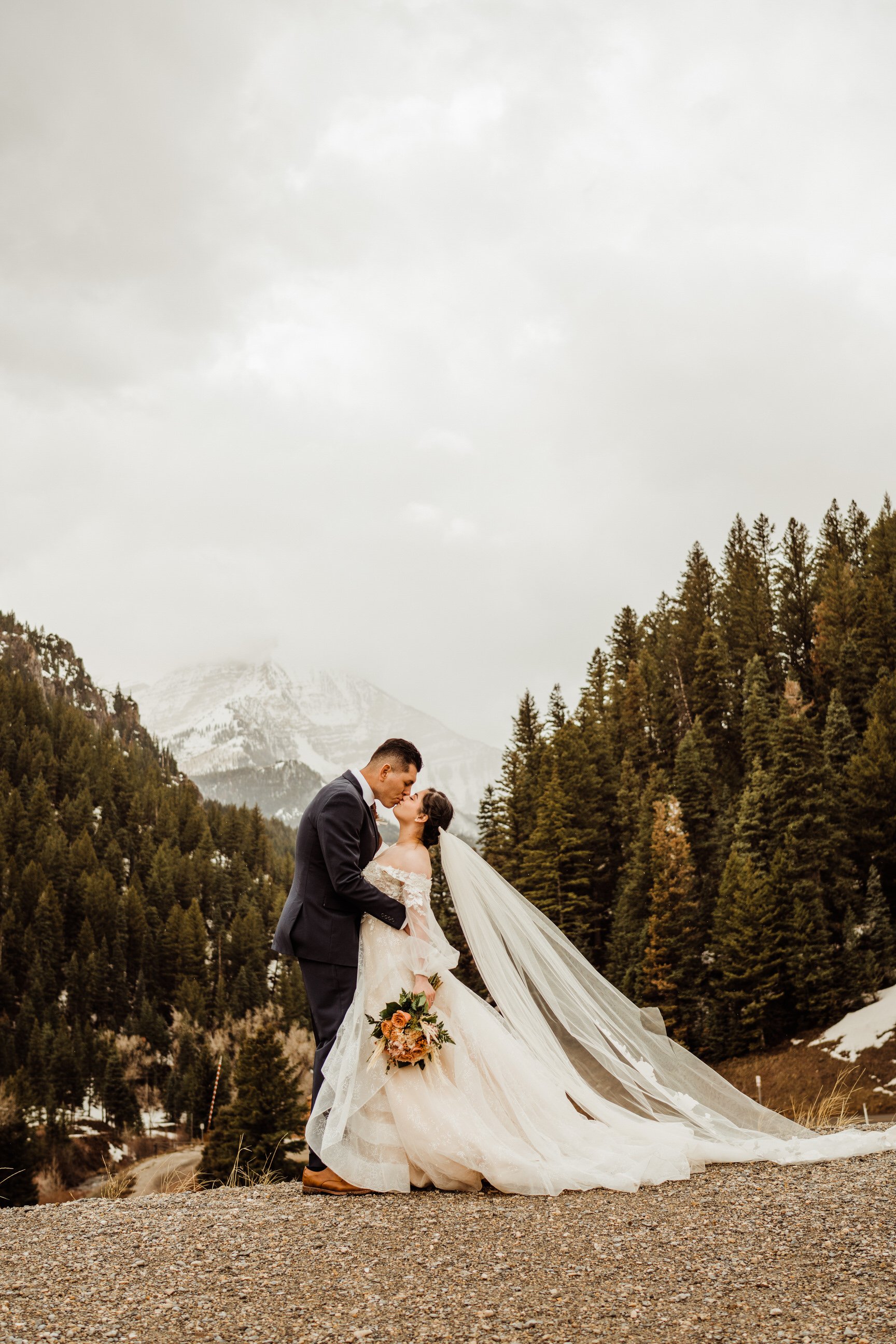 utah-mountain-elopement-couple-kiss-by-uinta-wasatch-cache-national-forest.jpg