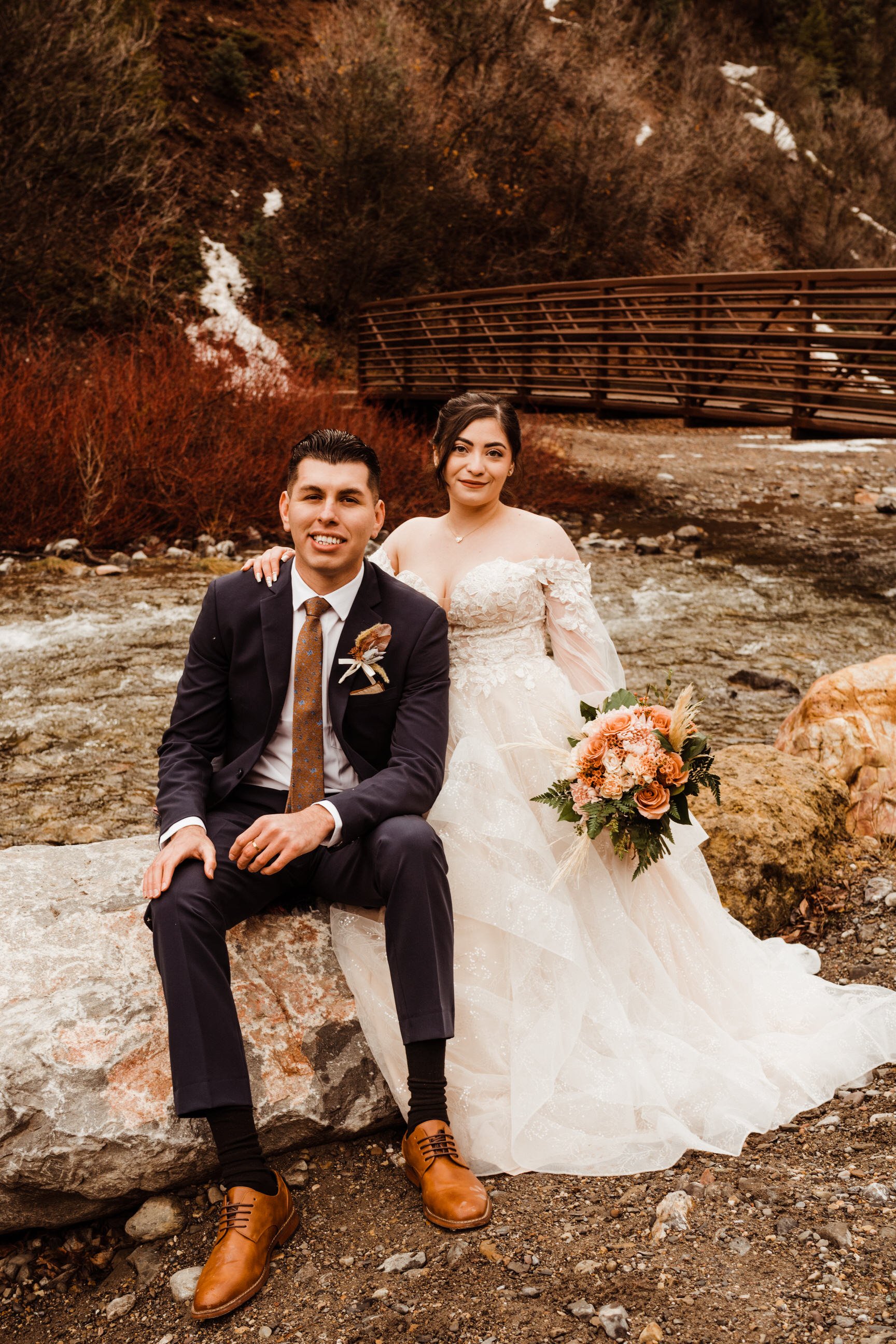 utah-mountain-elopement-bride-and-groom-by-bridge-trail-and-creek.jpg