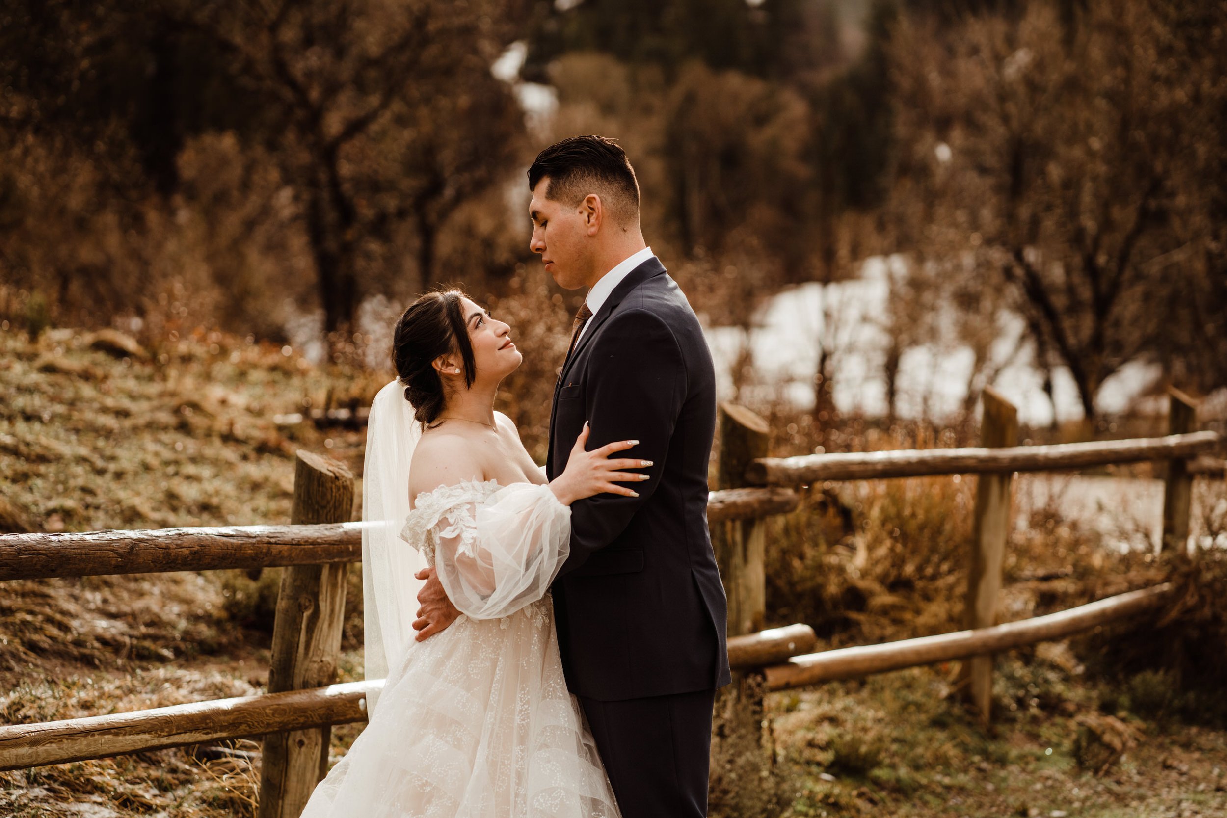 utah-mountain-elopement-romantic-photo-with-petite-bride-and-tall-groom.jpg