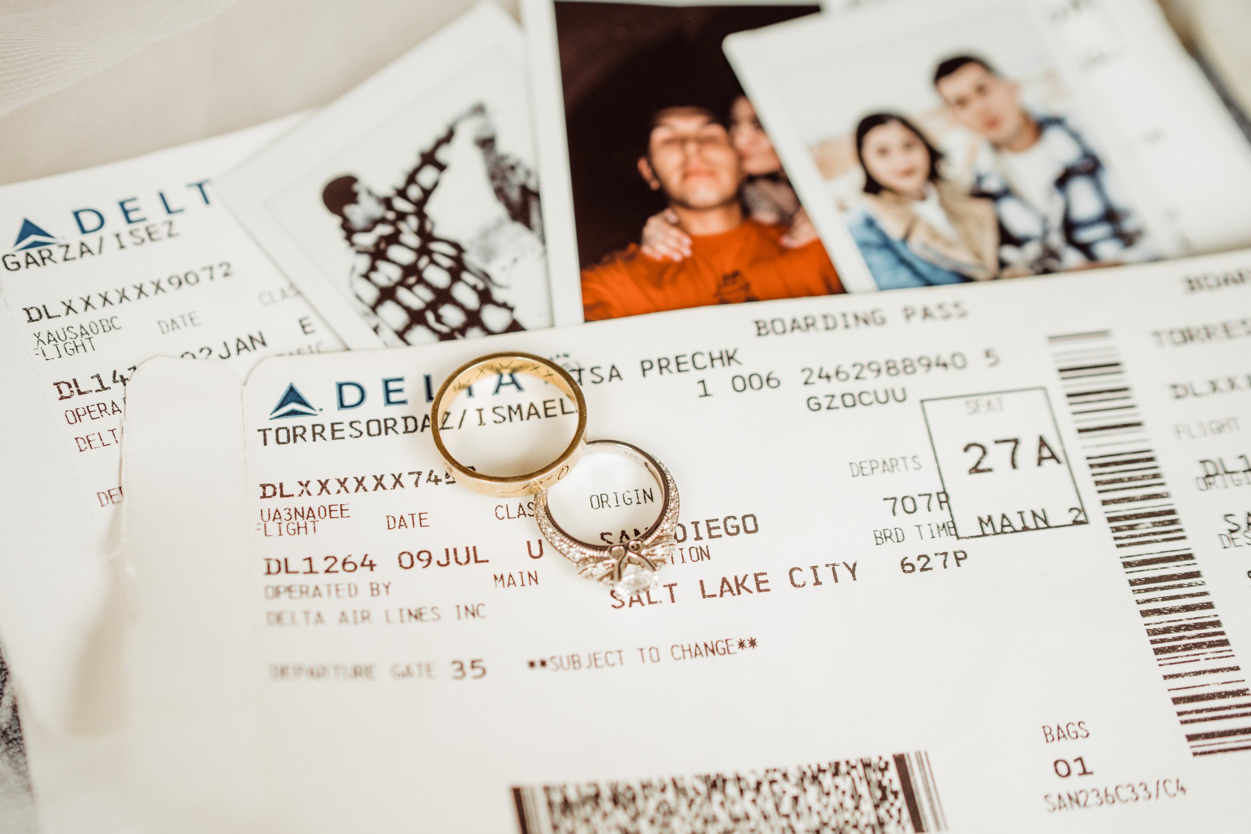 utah-mountain-elopement-wedding-ring-detail-with-boarding-passes.jpg