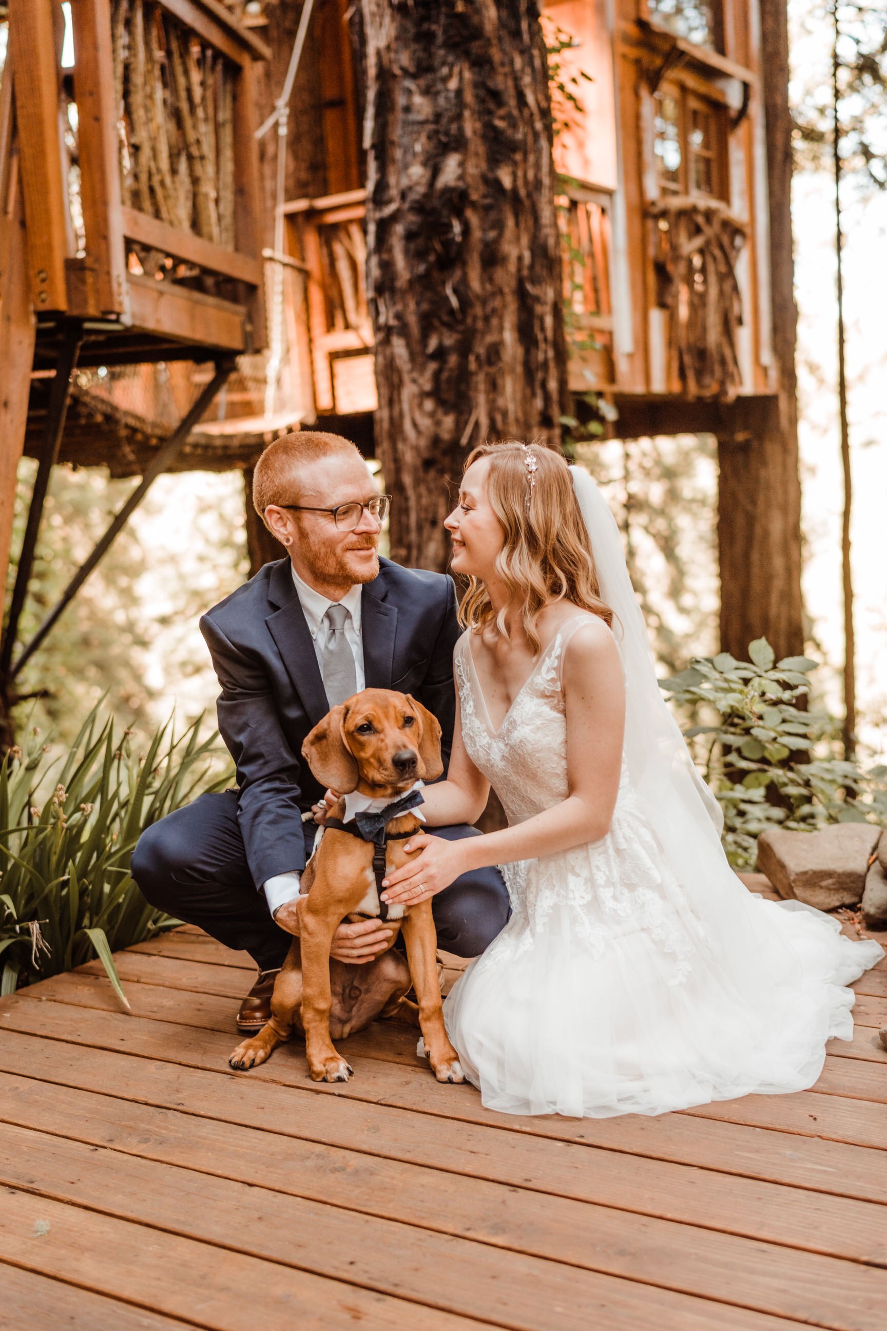 Wedding-in-the-Woods-Bride-and-Groom-Holding-Rescue-Puppy-at-Elopement-beneath-Redwood-Trees (5).jpg