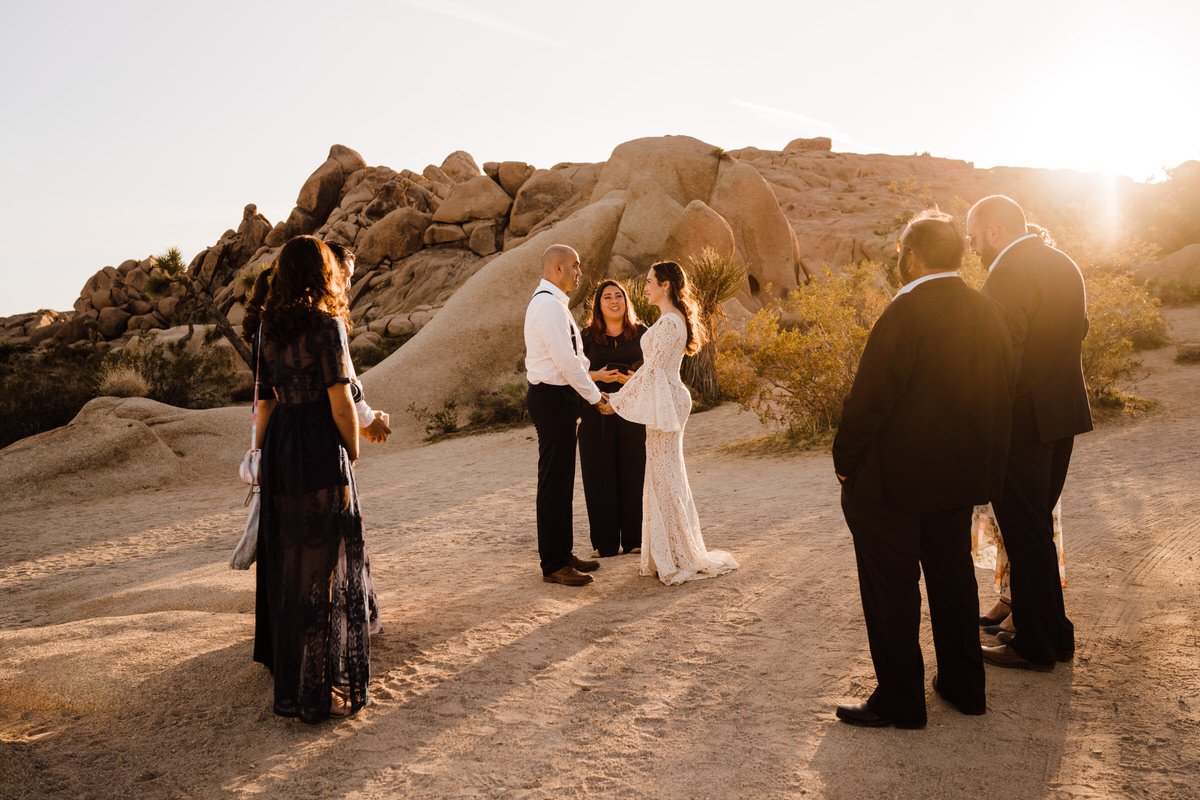 Joshua-Tree-National-Park-Small-Wedding-Ceremony-in-front-of-boulders-at-golden-hour.jpg
