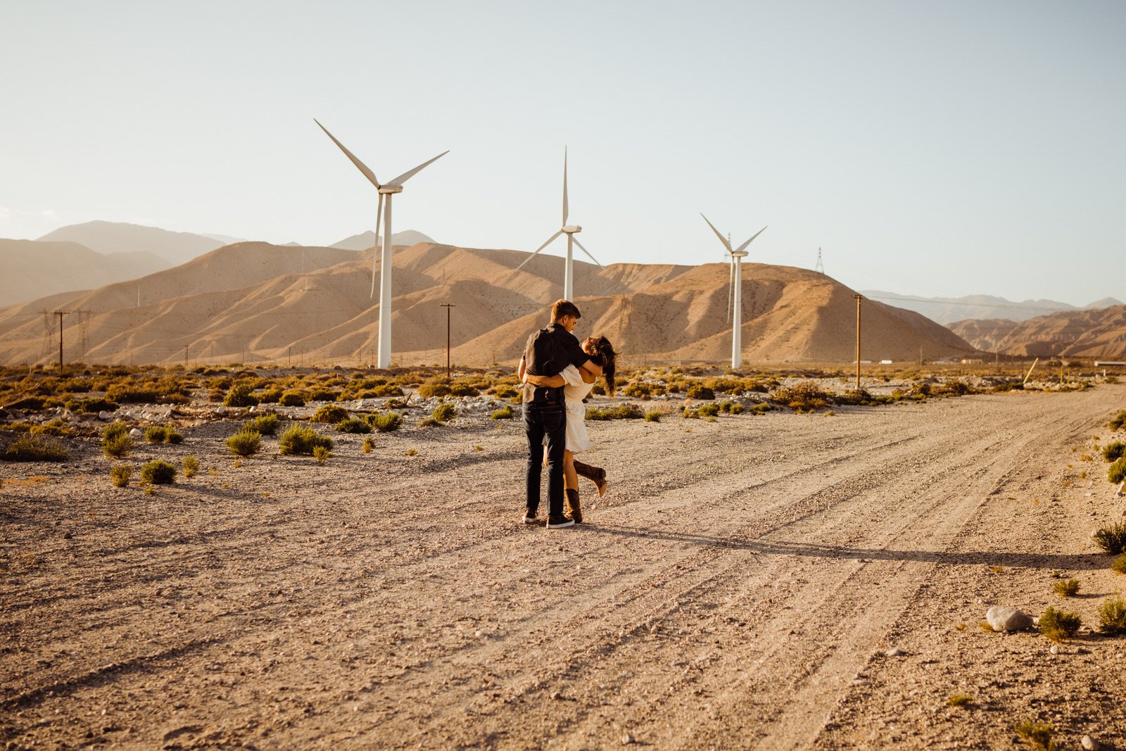 Palm-Springs-Engagement-Romantic-Photos-at-Golden-Hour-with-Windmills.jpg