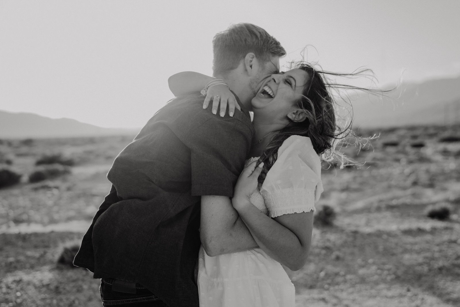 Candid-Laughing-Photo-Palm-Springs-Engagement-black-and-white.jpg