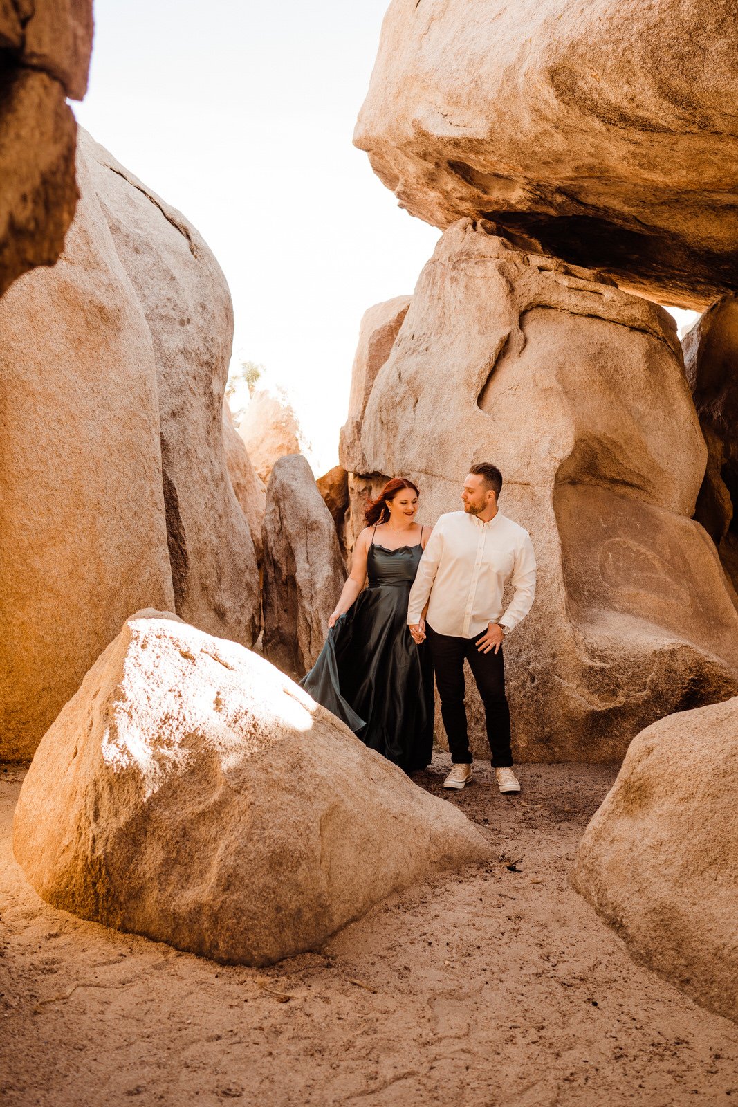 Desert-Boulder-Hiking-Engagement-Photos-in-Formal-Dress (2).jpg