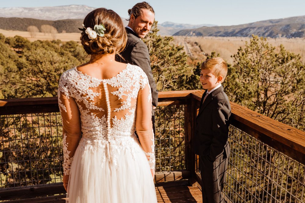 First Look with Groom and Stepson at Carbondale, Colorado Airbnb | Alternative, Adventurous Weddings | keptrecord.com