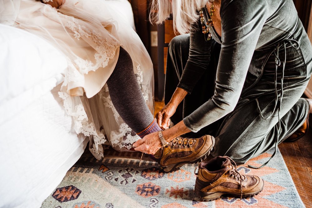 Bride getting ready for Colorado Elopement | Adventurous, Candid, Fun Wedding Photos | keptrecord.com