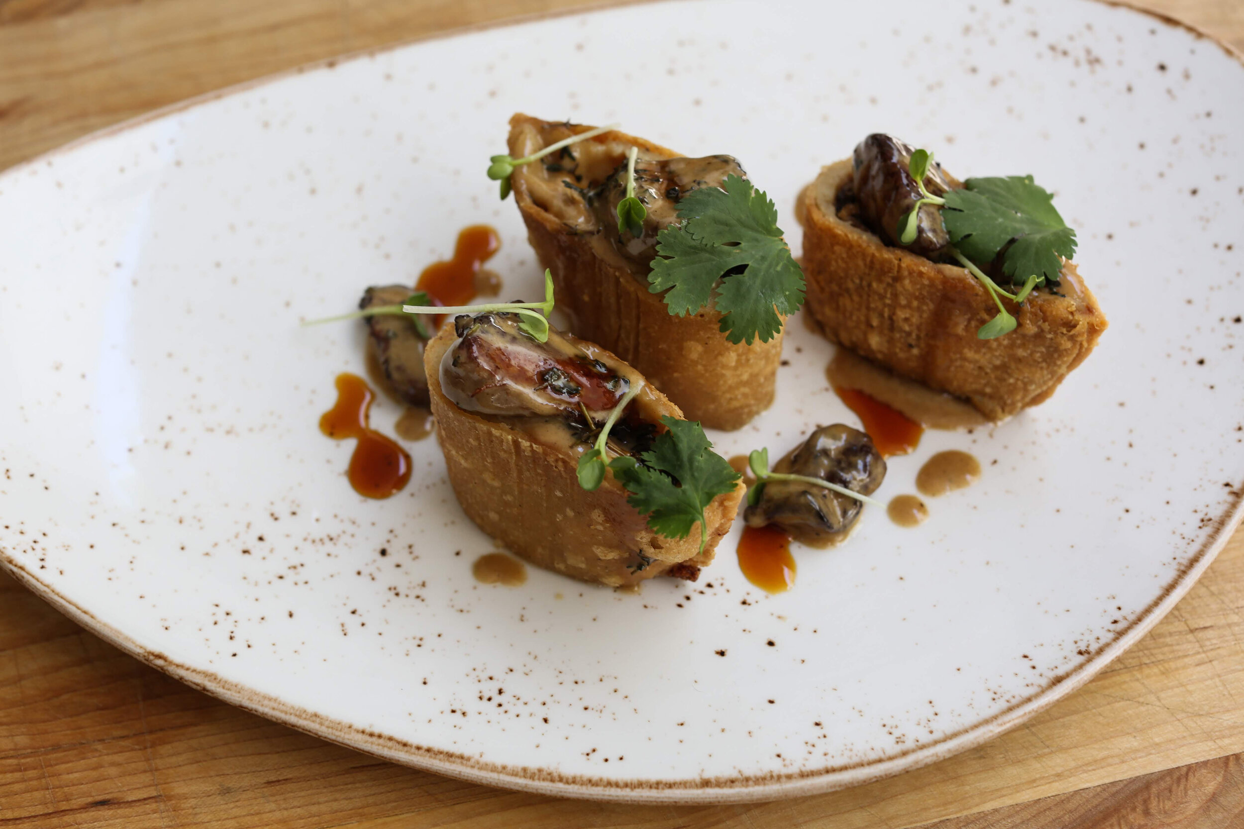 Duck Carnitas Empanada with Foi Gras and Orange-Habanero  Glaze