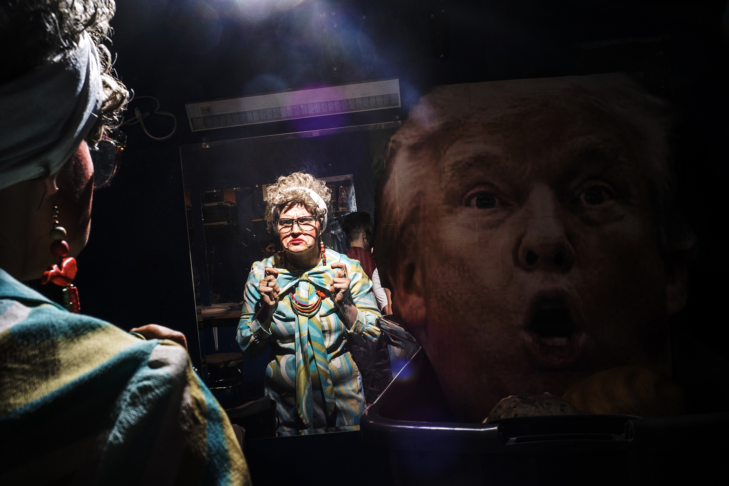  Varla stands beside an over-sized Trump mask in the Studio 13 dressing room shortly before emceeing a drag show on Thursday, May 31, 2018. 