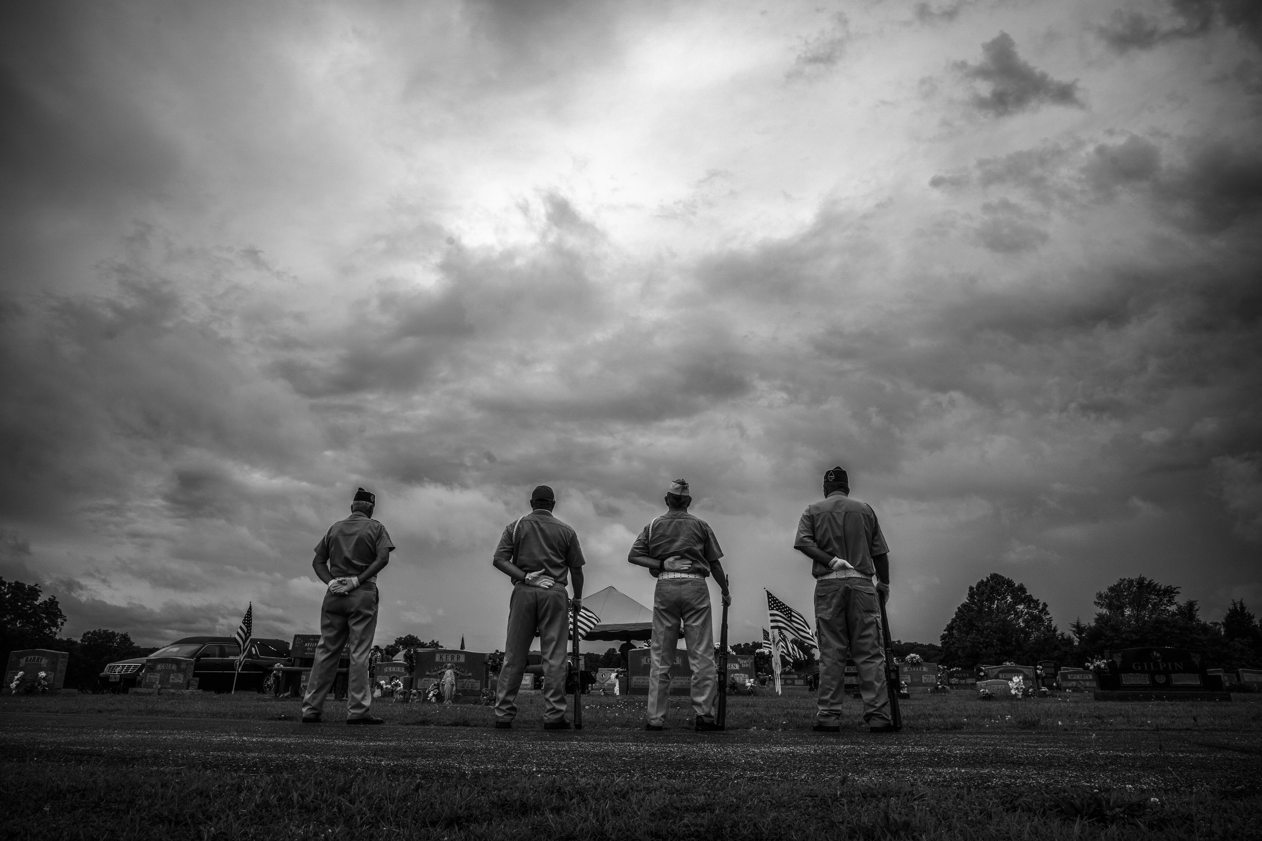  VFW 2442 Honor Guards wait before firing their 3 shot salute during a Vietnam veteran's funeral in central Missouri on Wednesday, Jun. 19, 2019. 