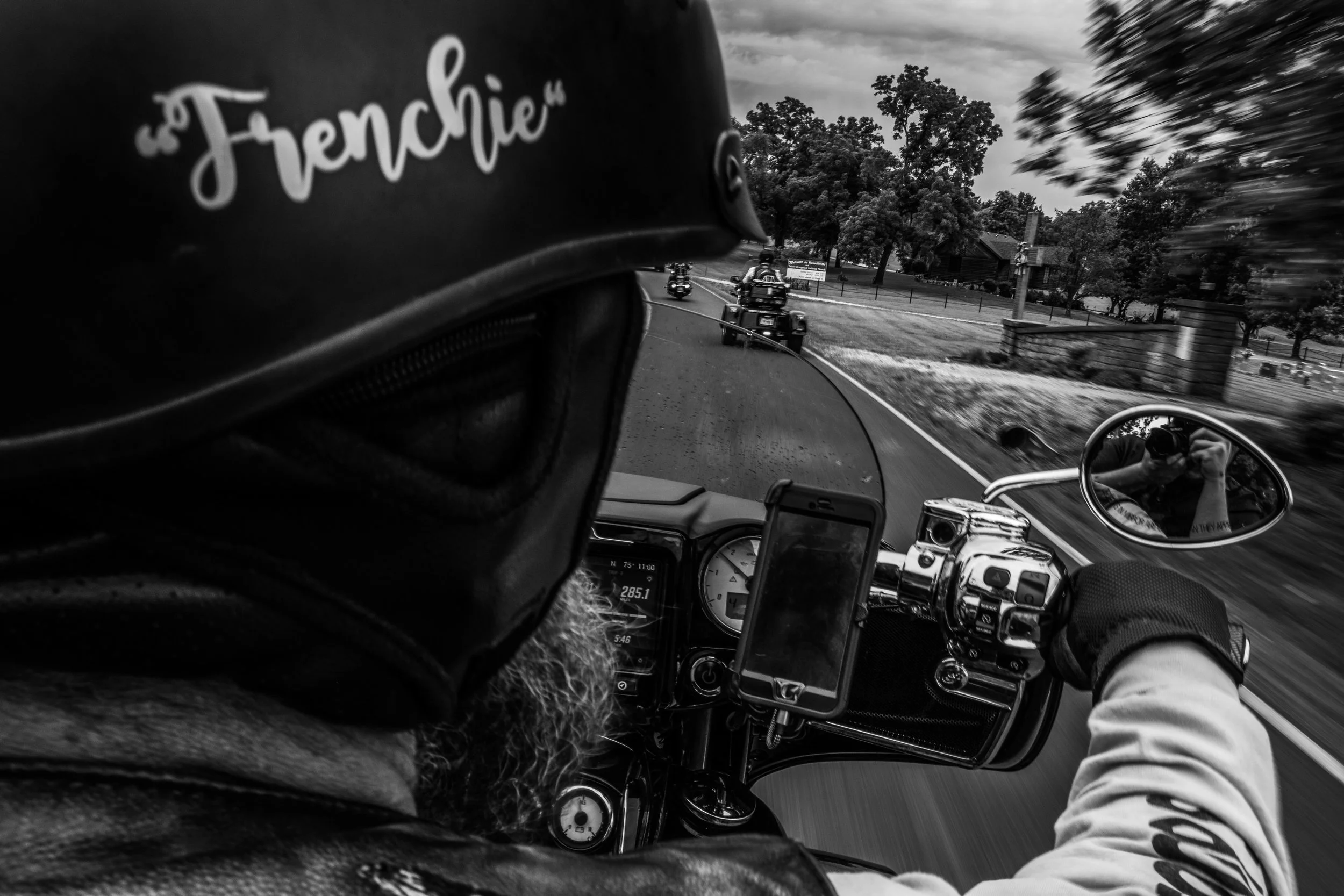 Patriot Guard Rider and Army veteran, Odin-Dan Levasseur, escorts a veteran funeral near Russellville, Missouri on Wednesday, Jun. 19, 2019.