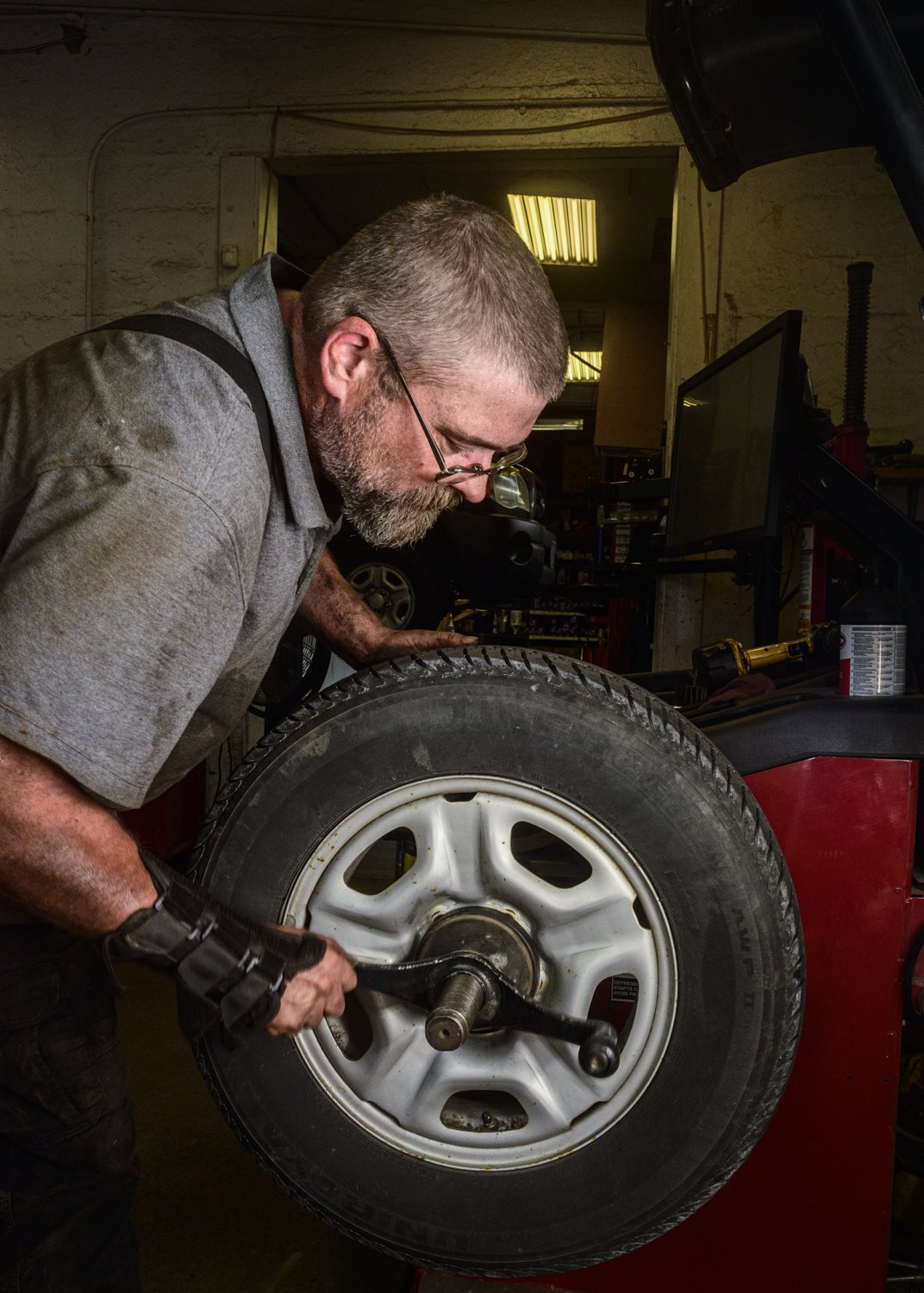  Joel Stevenson balances the tires off of a 2008 Toyota Tacoma at Pleasant Street Tire and Auto Service in Cynthiana, Kentucky on Wednesday, June 16, 2021.    Stevenson has been working at the establishment for approximately one month and recently mo