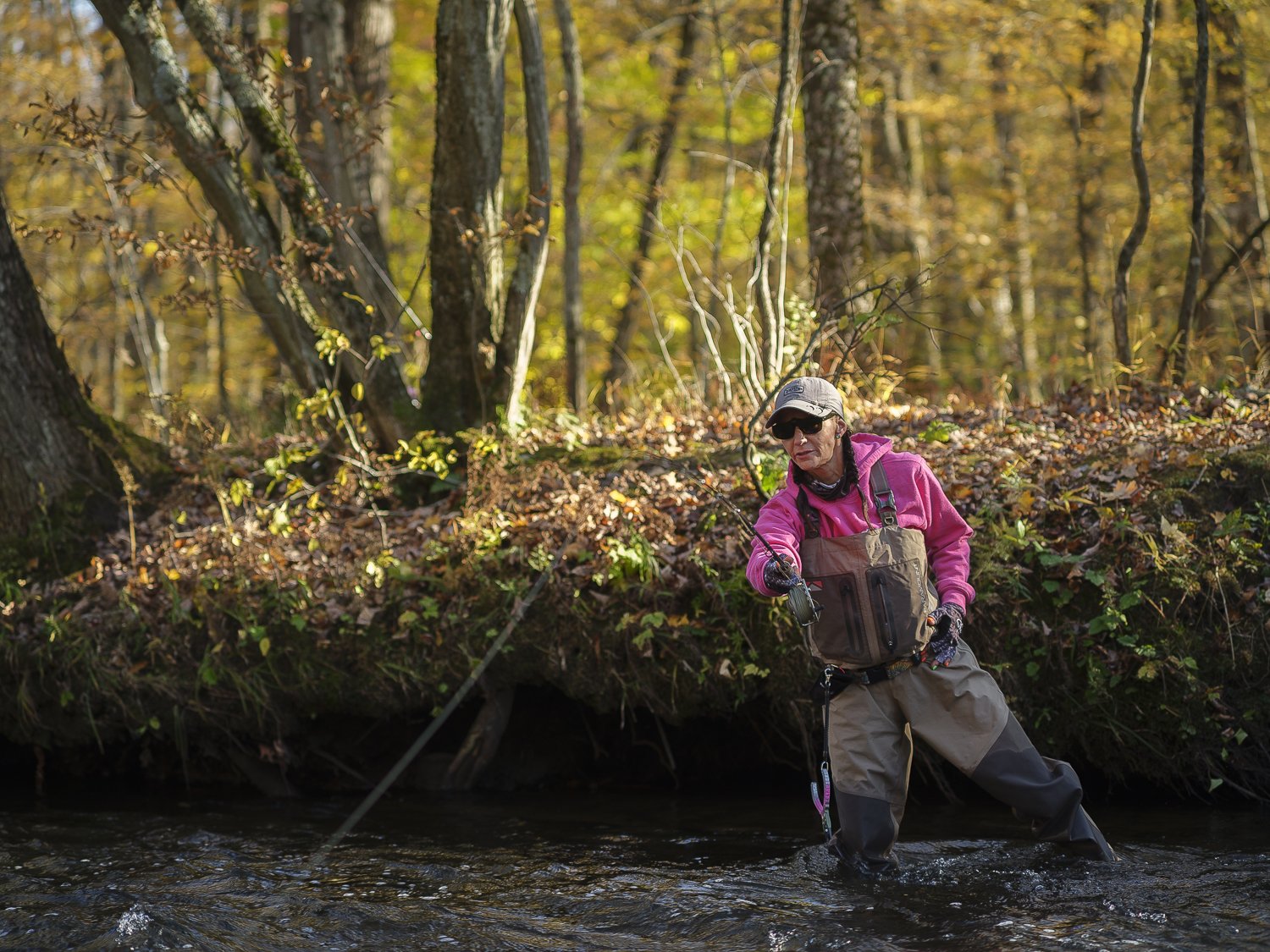  A female angler fishes on the Salmon River near Altmar, New York 