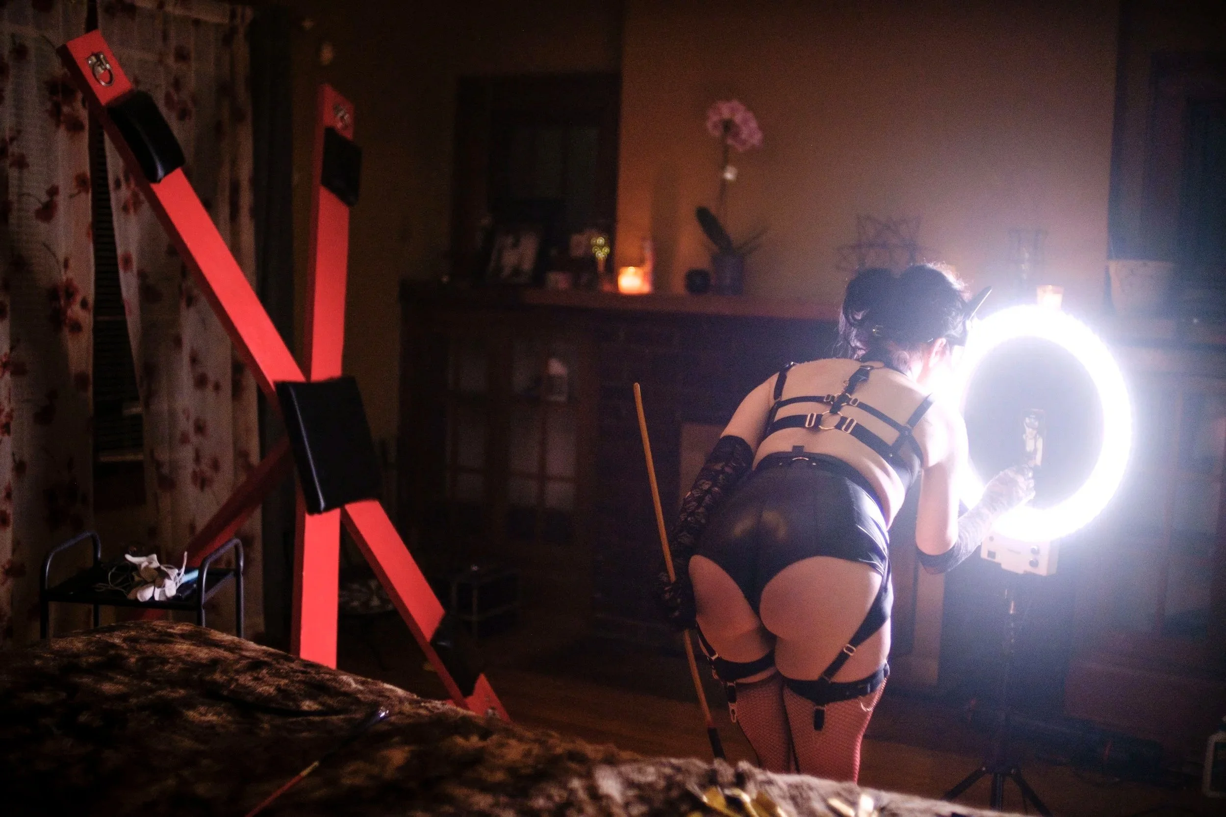  Scarlett (pseudonym) ends her Onlyfans video at her home on Thursday, October 28, 2021.  She has been shifting to online entertainment platforms to protect her health due to the pandemic.   Content creators across the country have had to compete wit