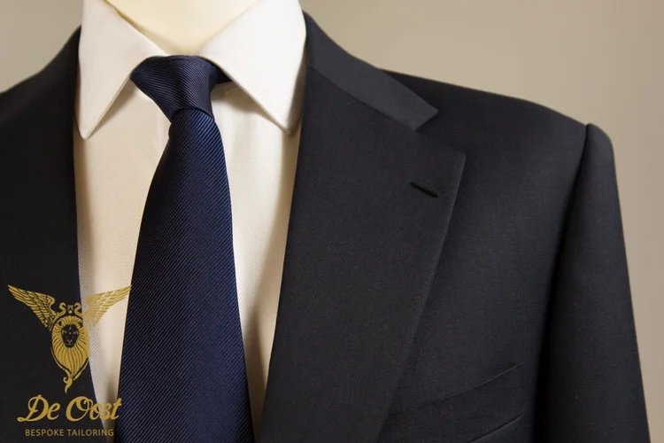The Navy Suit  De Oost Bespoke Tailoring - Bespoke Tailoring Guide: Custom  Suits, Wedding Suits, Fabrics, Tailoring & Maintenance Tips
