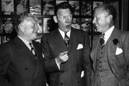 Comedian Fred Allen and colleagues with typical 50's suits