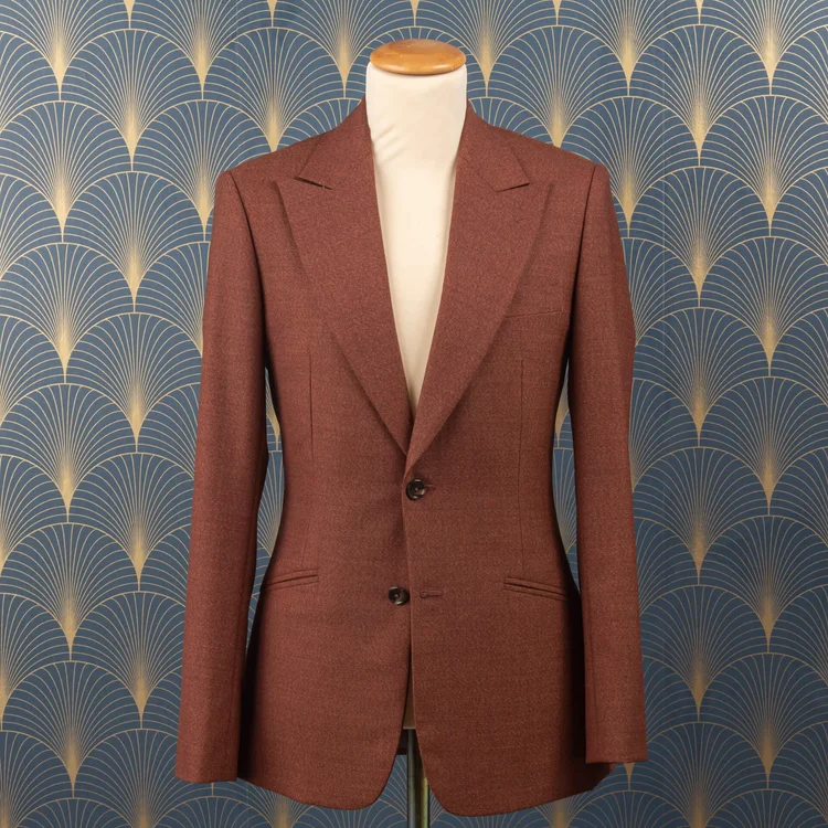 The buttons on the sleeve of a jacket — De Oost Bespoke Tailoring ...