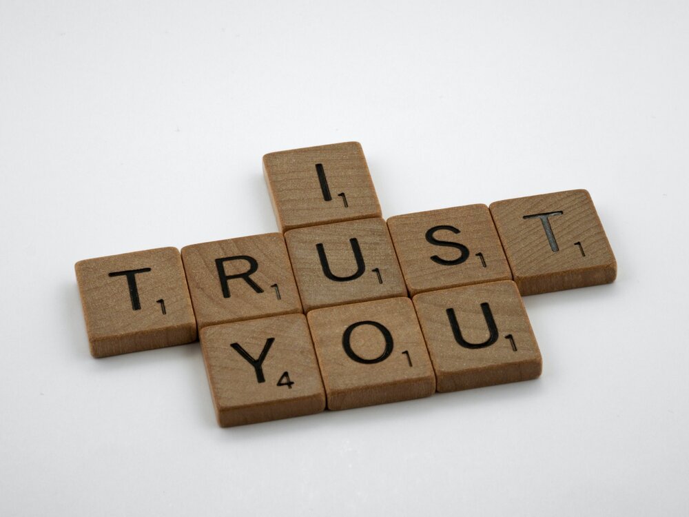  'I Trust You' spelled out in wooden letters 