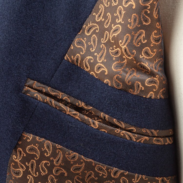 Brown golden mini paisley lining in a navy blue jacket