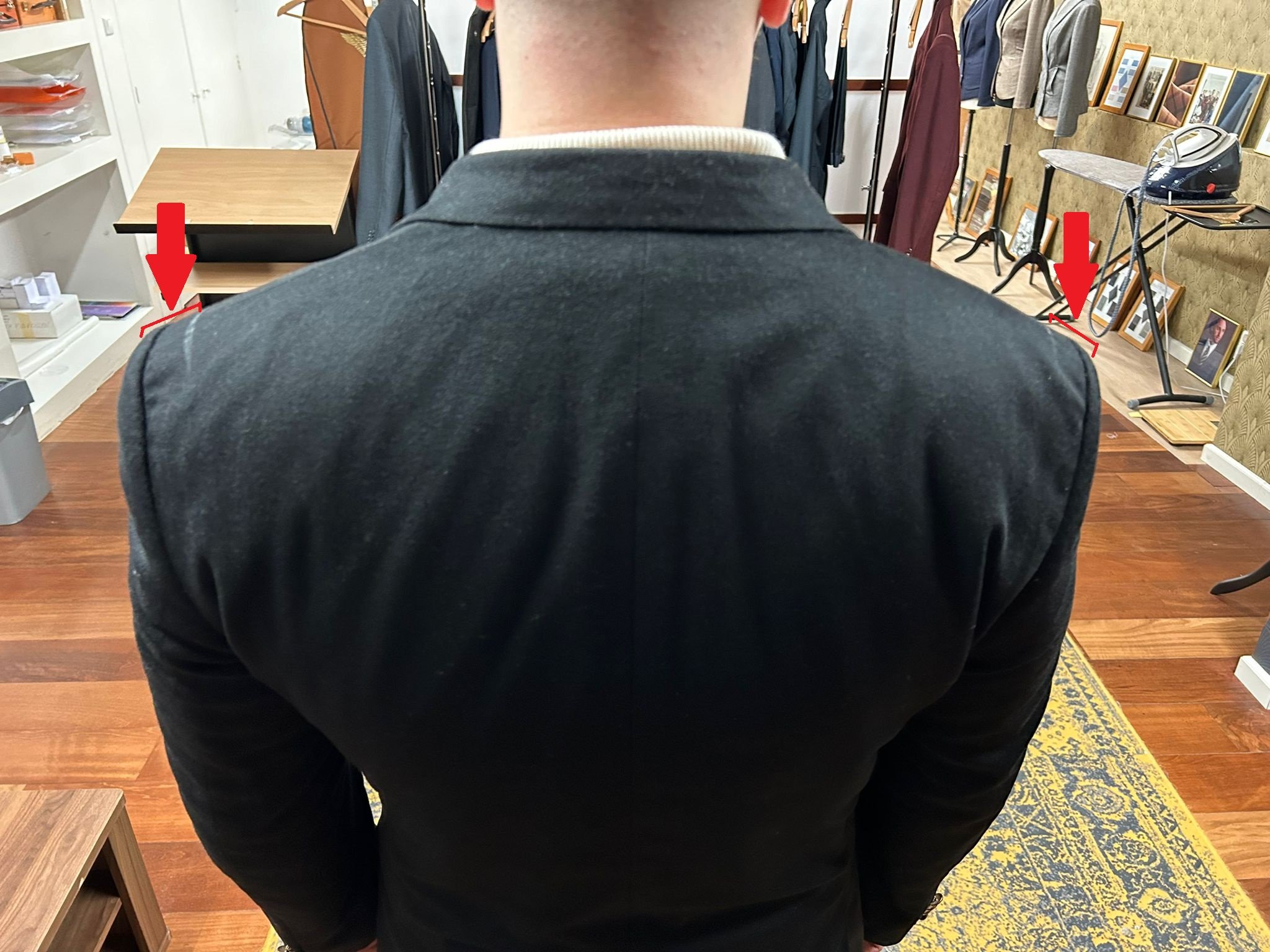 Shoulders (Suit) Jacket that are to broad and oversized before alterations, back view