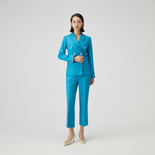 Turquoise ladies bespoke suit with gold buttons