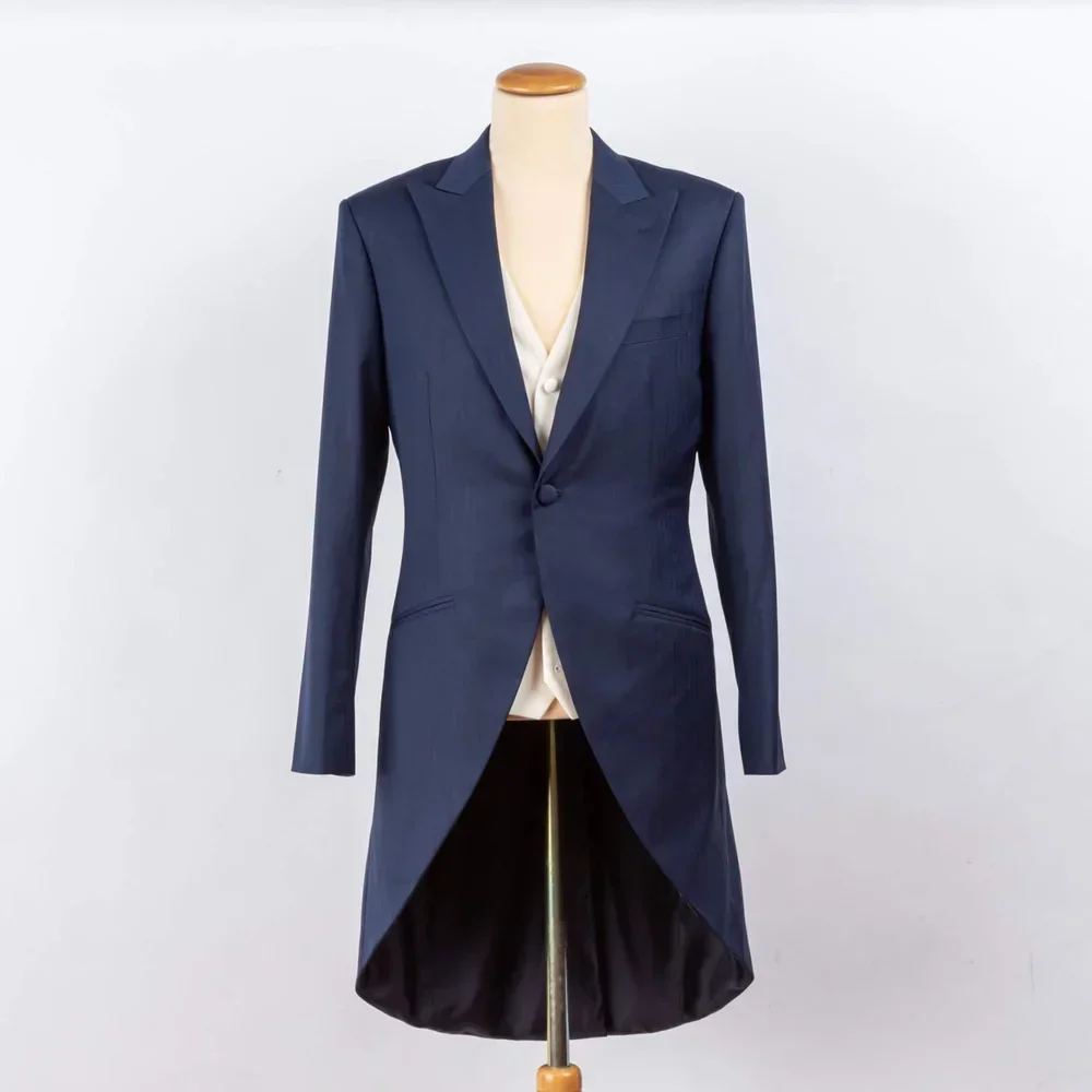 Navy morning coat for groom with cream waistcoat