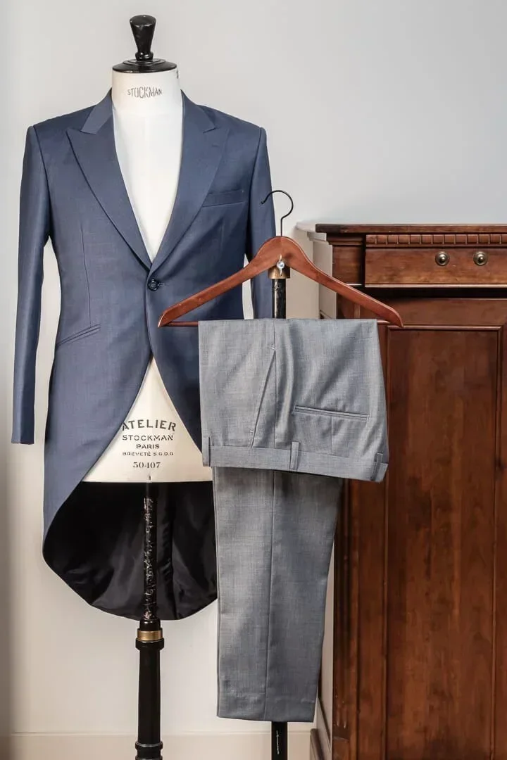 Navy morning coat for groom with grey trousers