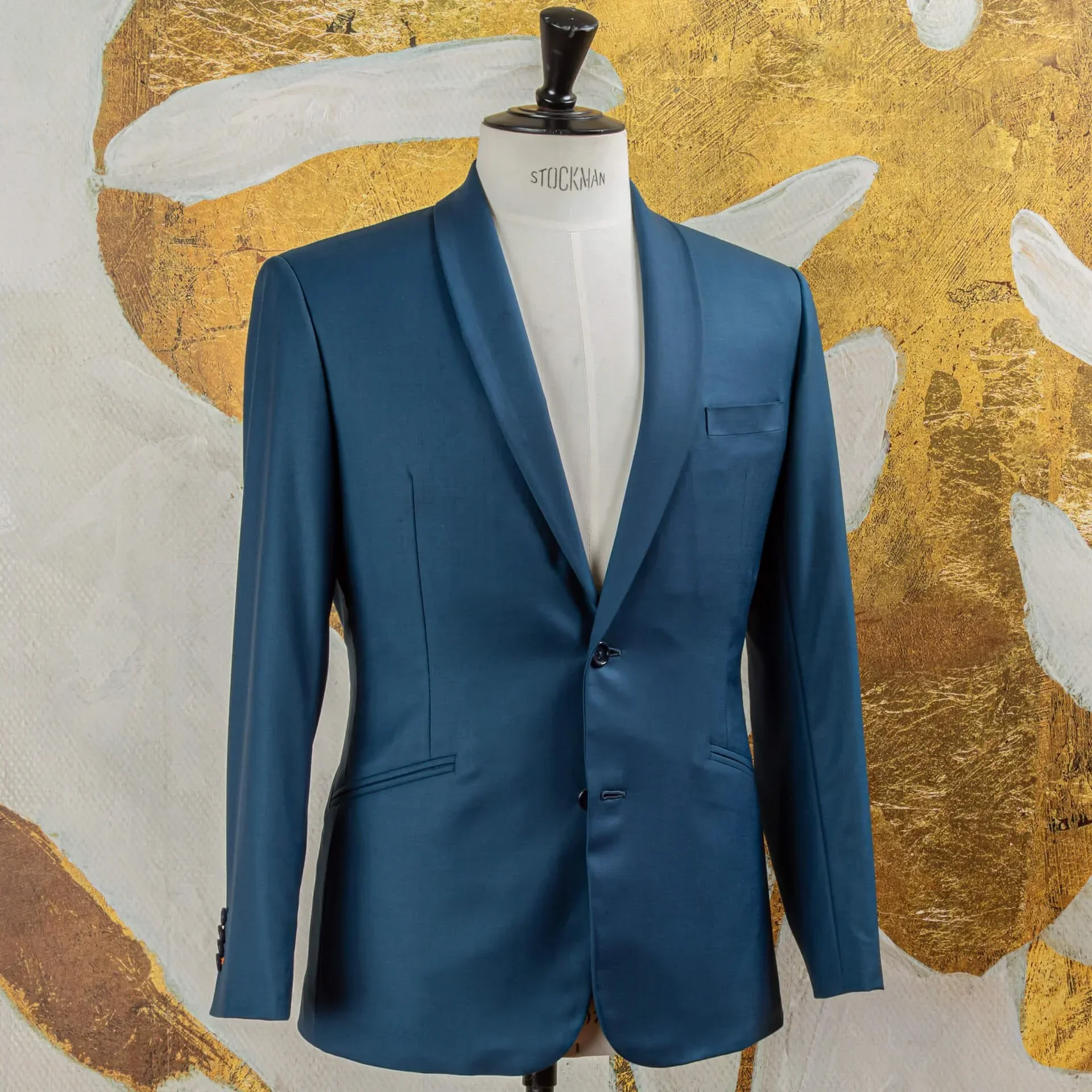 Custom tailored petrol blue jacket with shawl collar, three quarter view