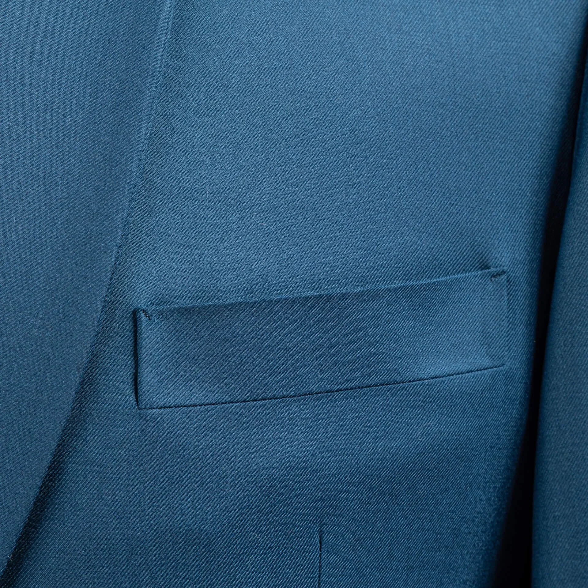Close-up breast pocket bespoke jacket petrol blue Super 140s wool