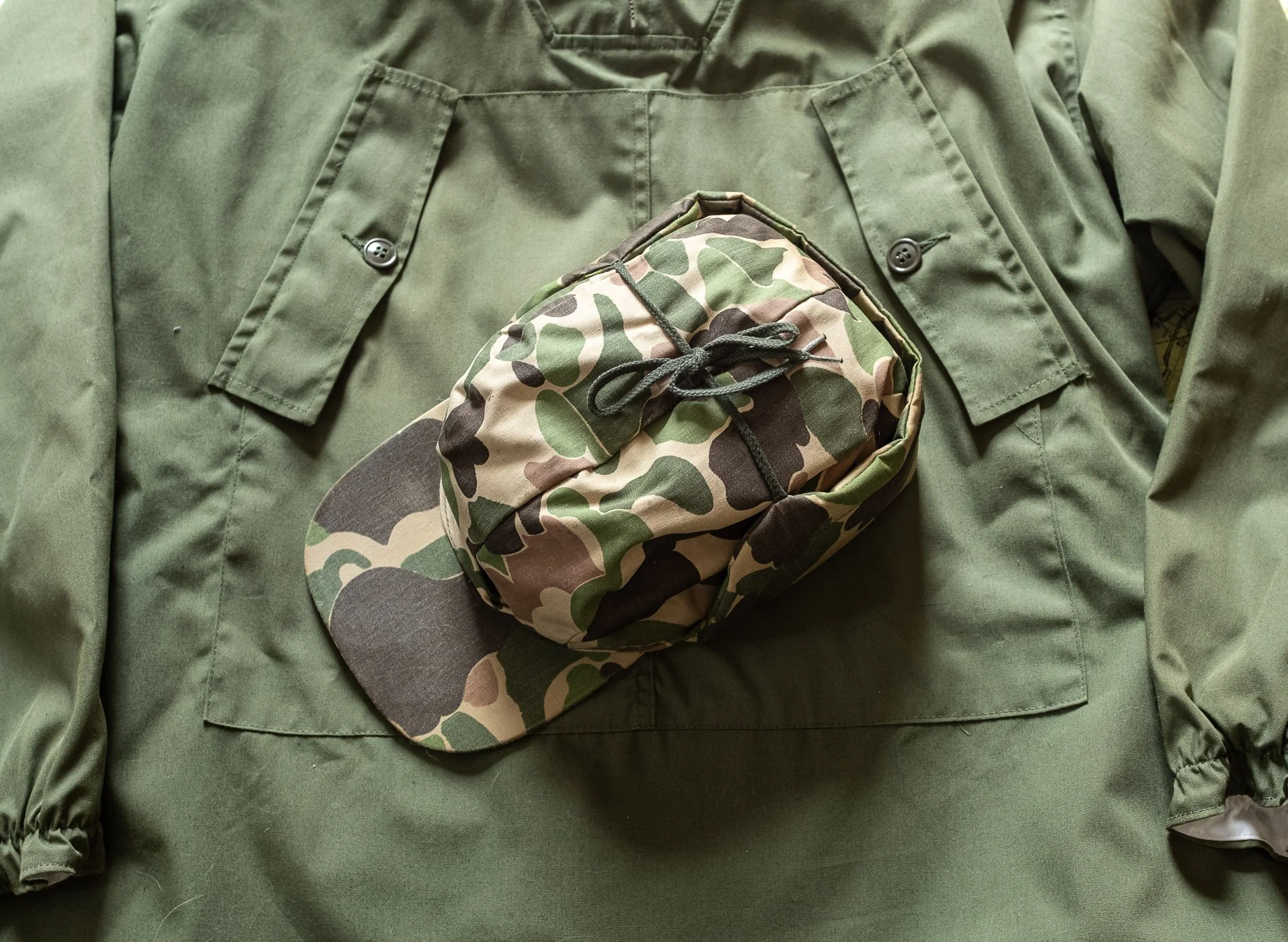 1950s_camo_eddie_bauer_goose_down_cap.jpg