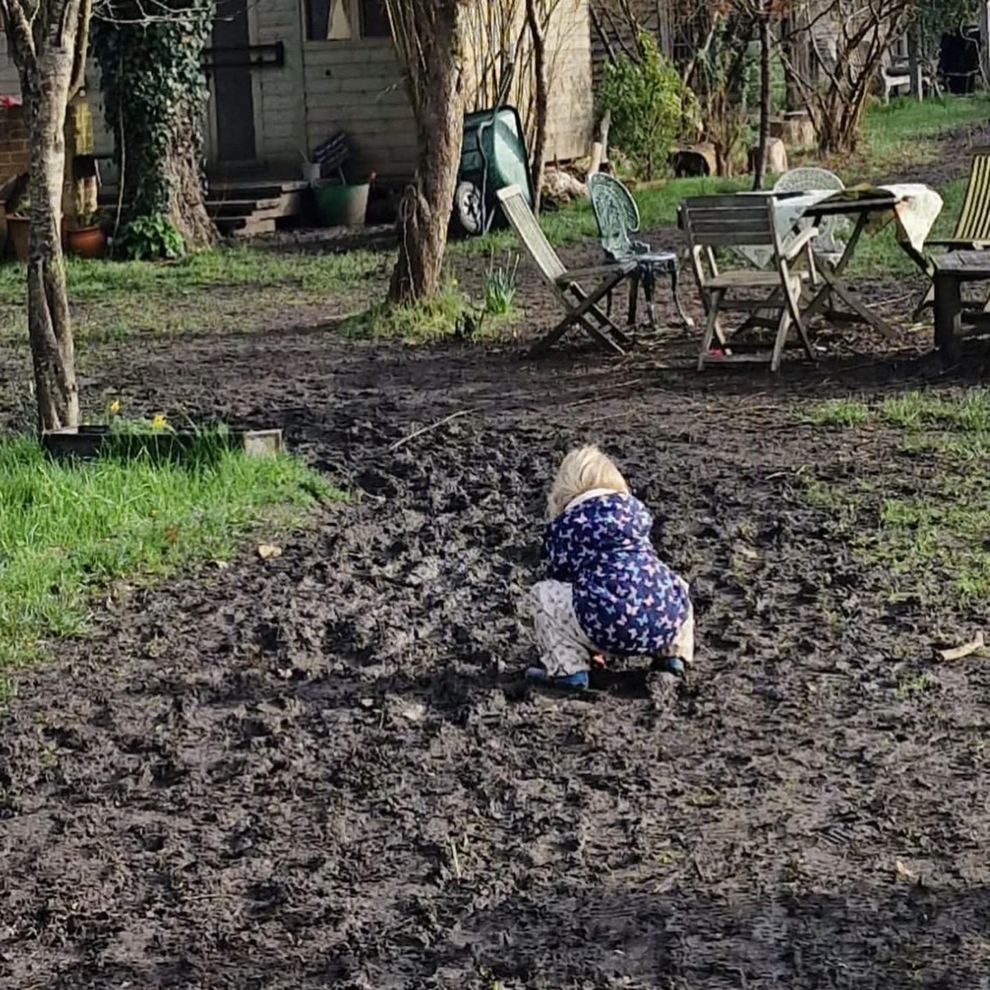 One man's mud is another man's...muddy treasure! 

First picture shows a space2play attendee carrying out the highly important and underrated task of harvesting mud, crucial for the mud kitchen...

Second picture shows the garden volunteers wellies w