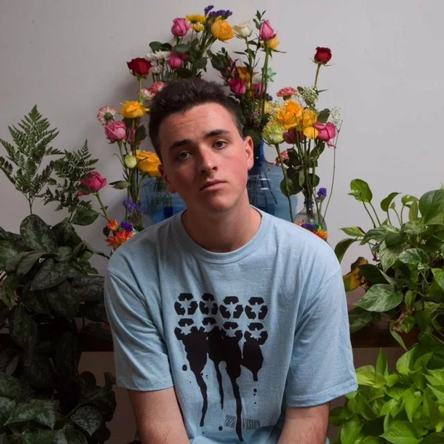 Devin wearing a tee he created with Recover Brands