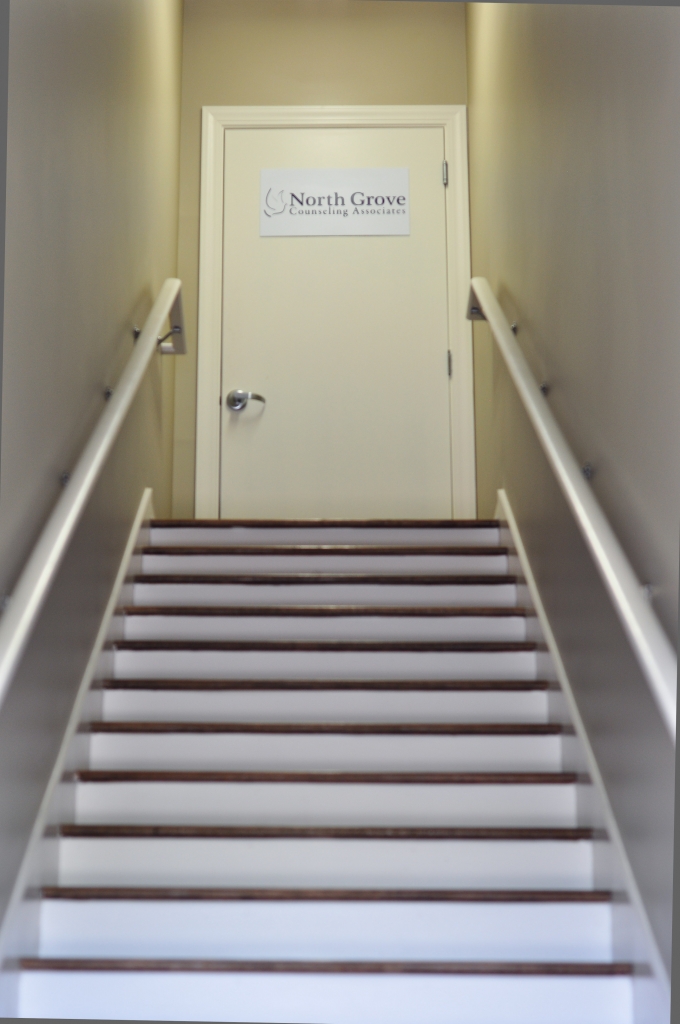 Our office is on the second floor at the top of the stairs.