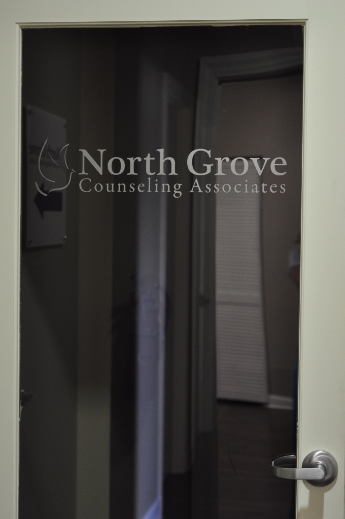 You will see our frosted glass office door.