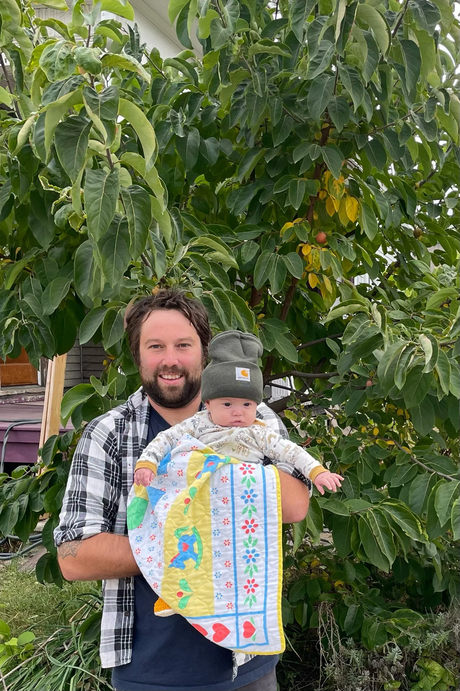 Arborist Rew Nagel with his son Jasper